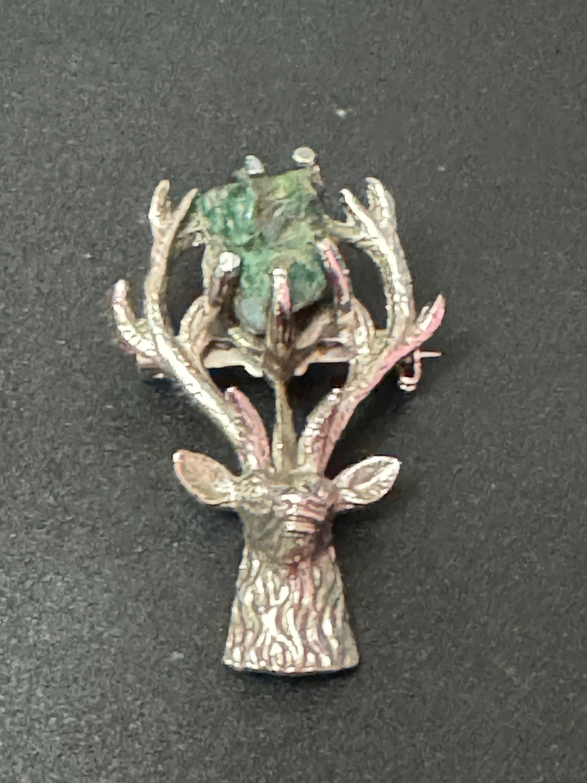 Vintage silver tone Scottish Celtic green gemstone stag brooch