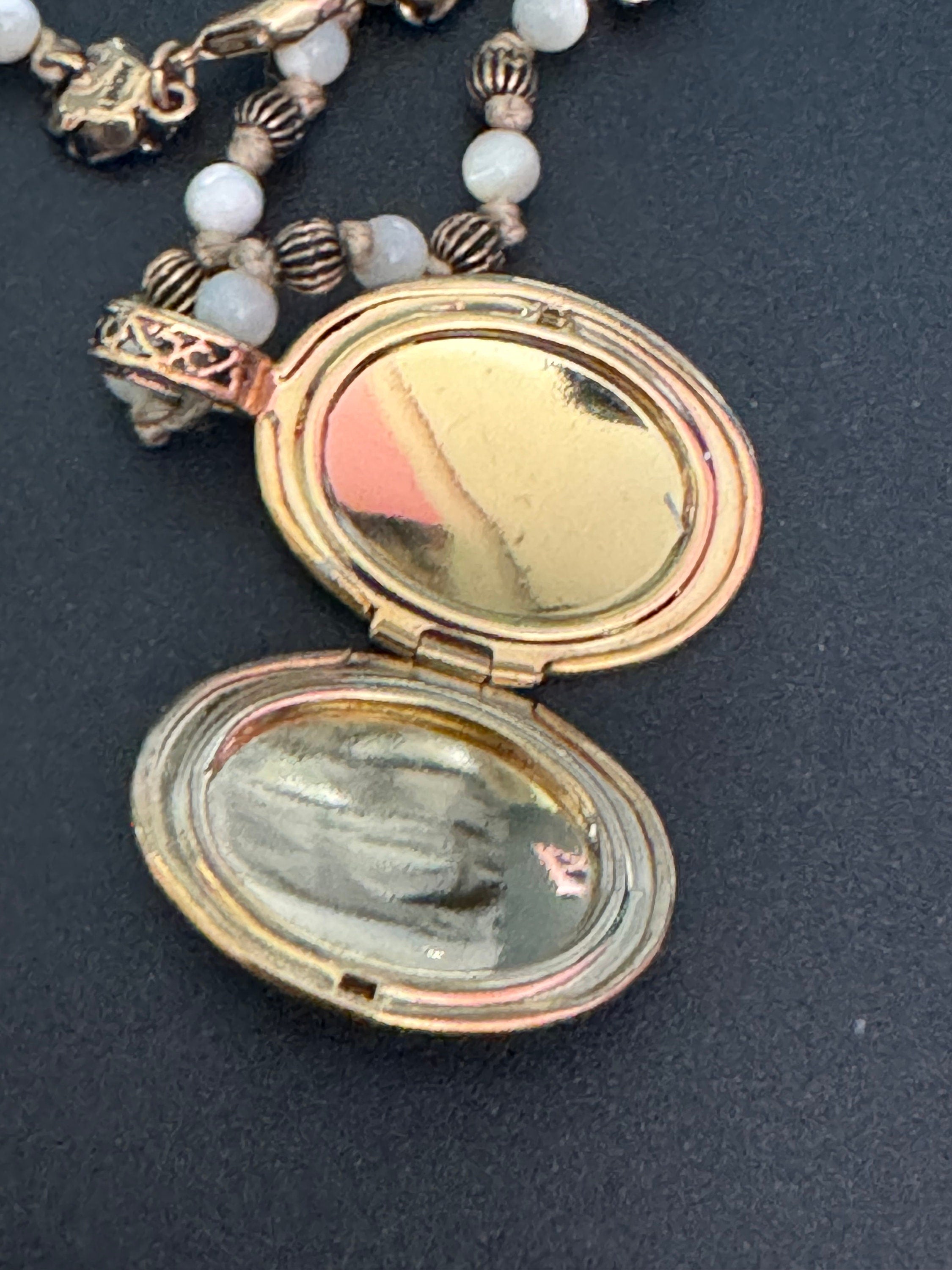 Signed MONET Beige beaded gold tone oval locket pendant necklace with rose detail