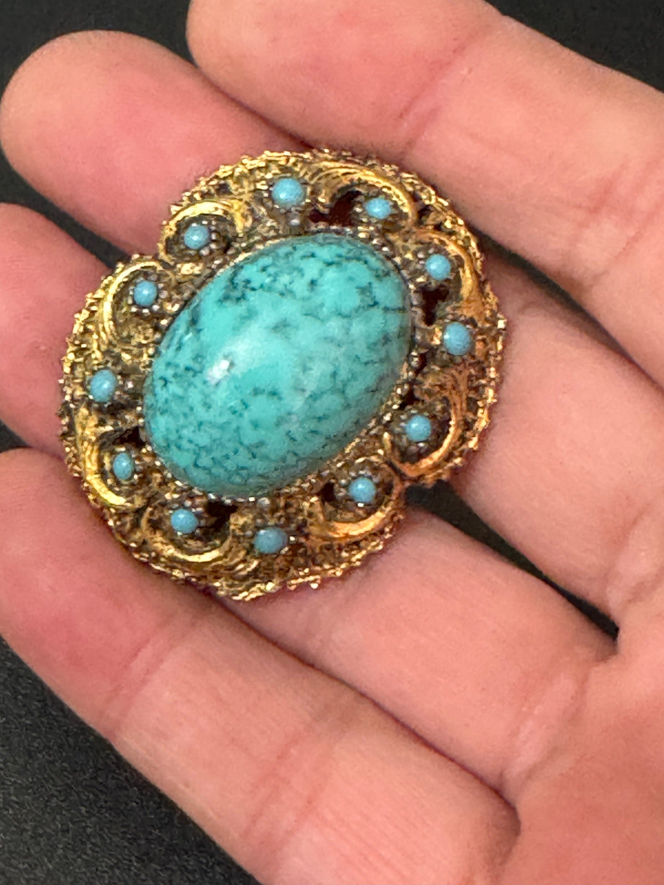 Vintage ornate gold tone turquoise oval cabochon brooch