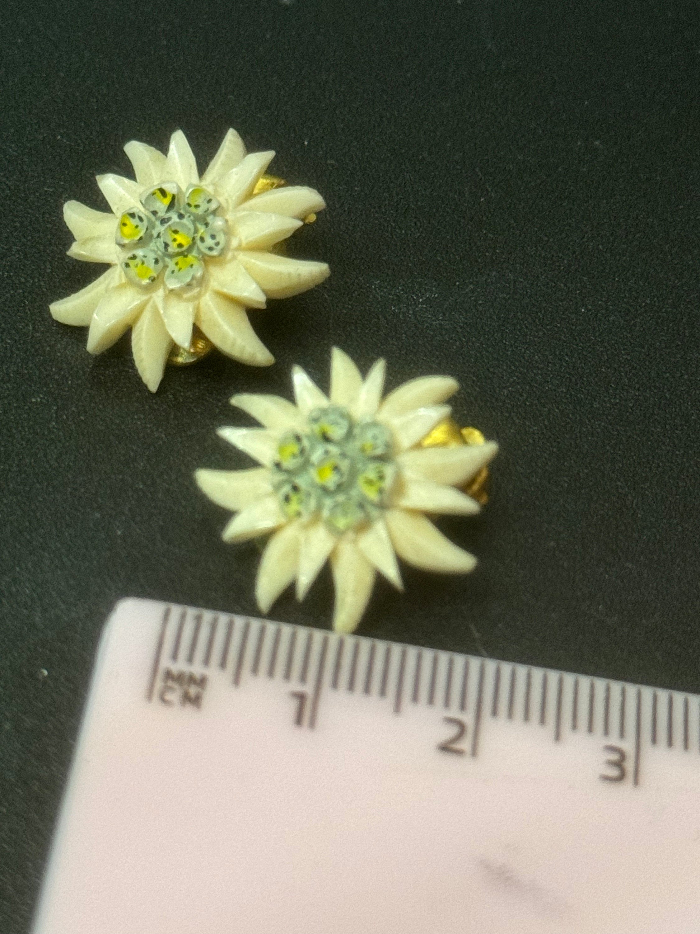 Vintage early plastic celluloid Edelweiss floral clip on earrings art deco