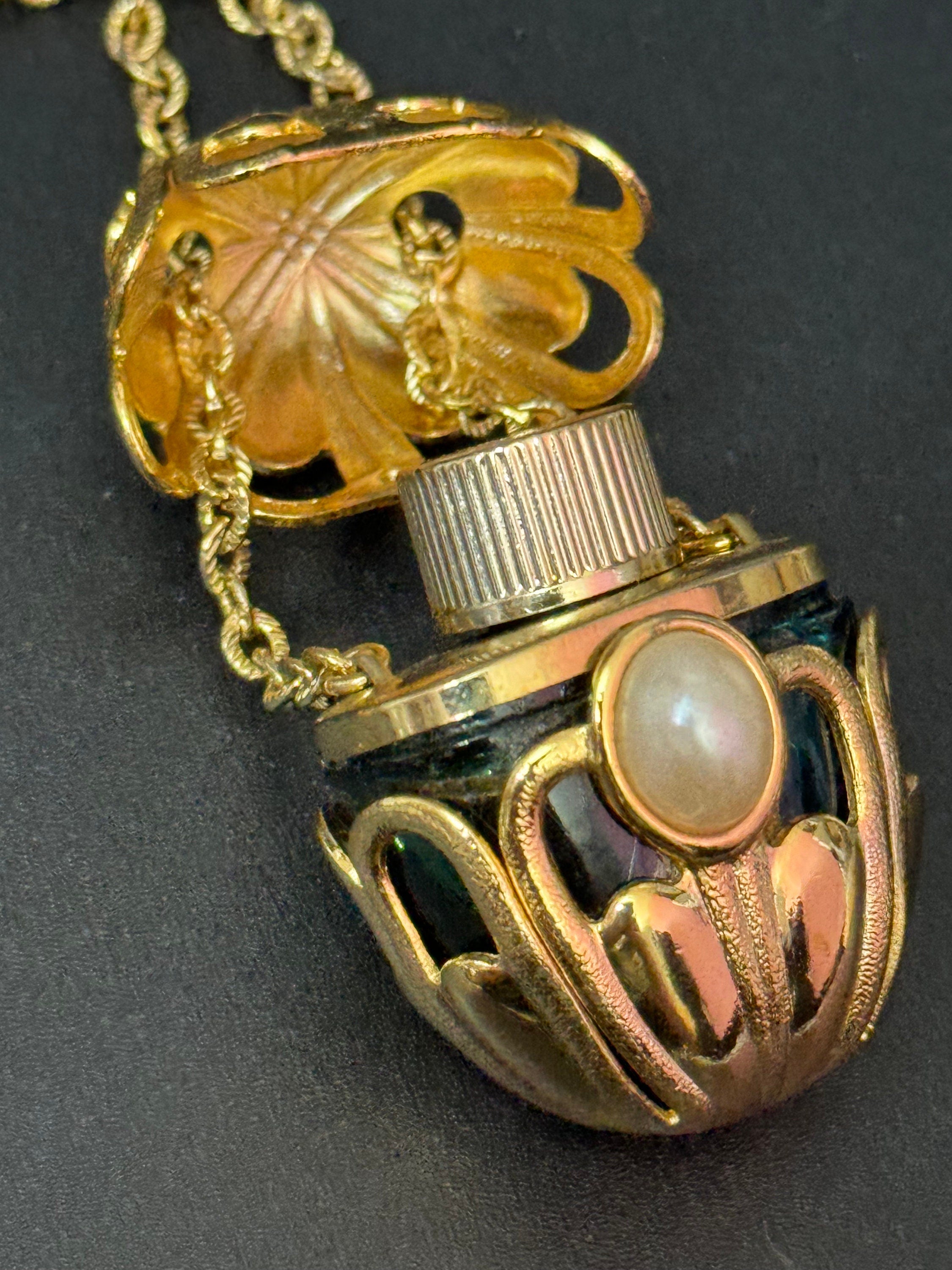 Vintage AVON signed gold tone faux pearl cabochon caged perfume bottle pendant on  80cm chain