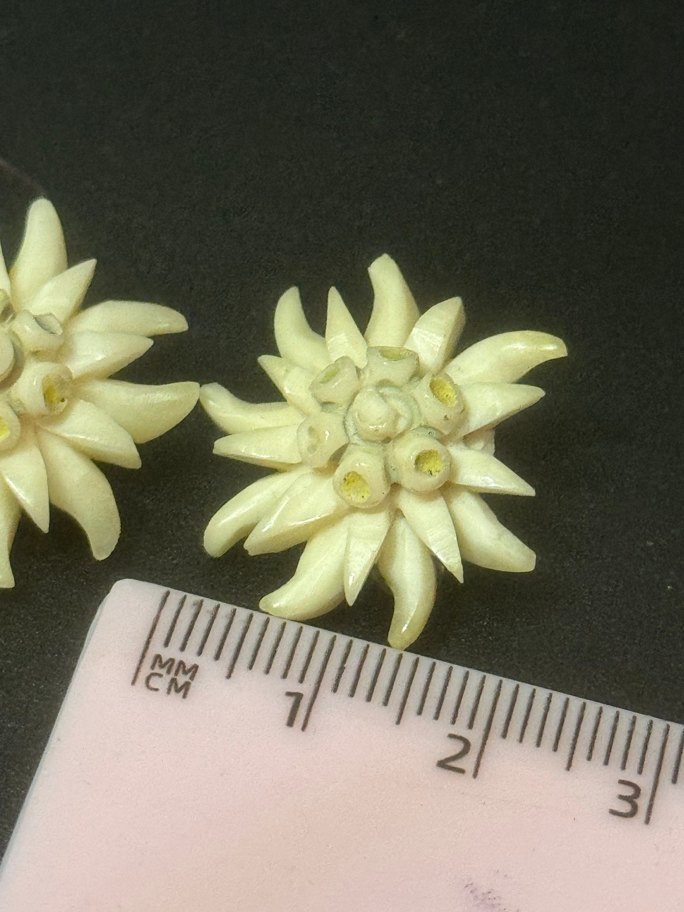 Vintage early plastic celluloid Edelweiss floral clip on earrings art deco