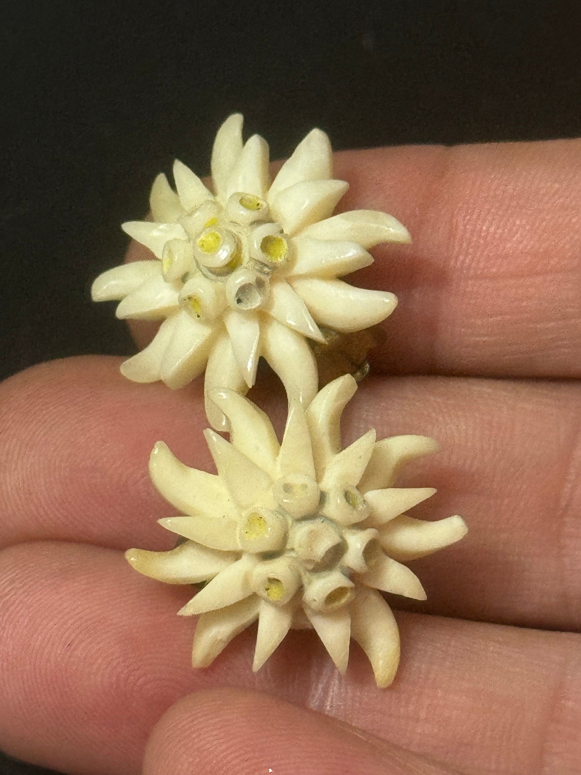 Vintage early plastic celluloid Edelweiss floral clip on earrings art deco