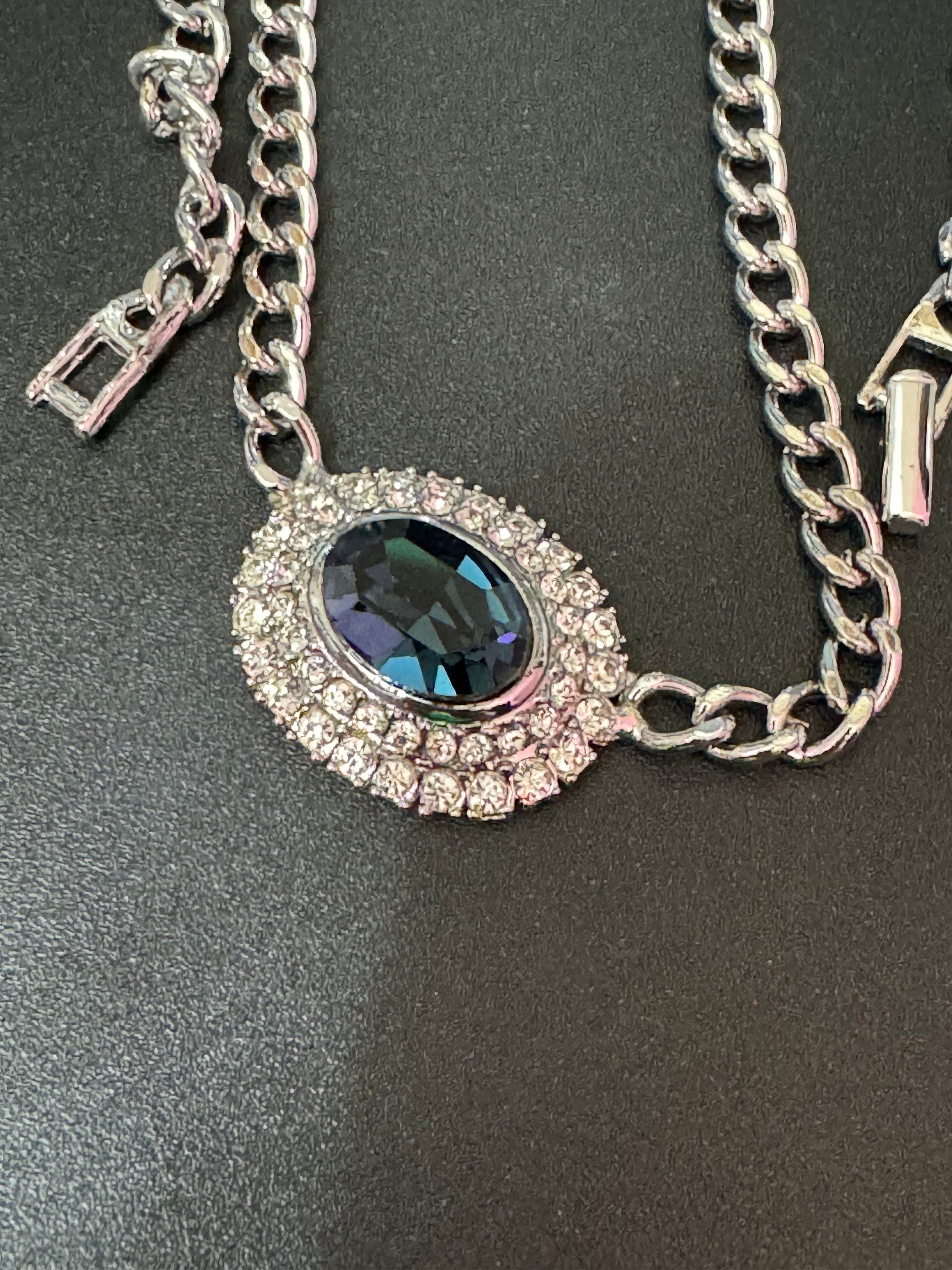 Vintage 1980s Swarovski crystal set sapphire blue cabochon and clear diamanté oval pendant necklace silver tone high end old shop stock