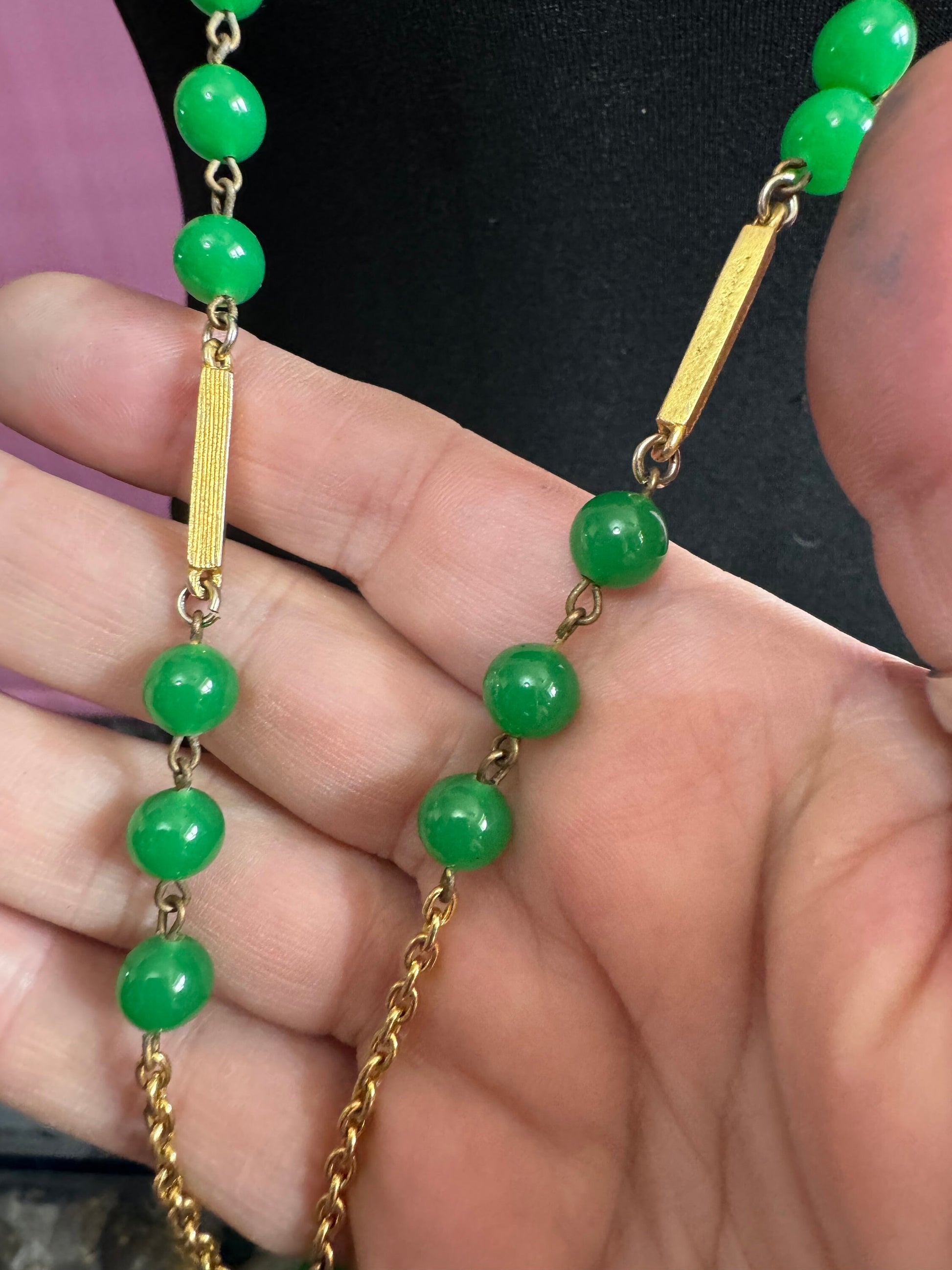 1970s flapper length gold tone metal necklace with bright green jade or glass beads 120cm modernist