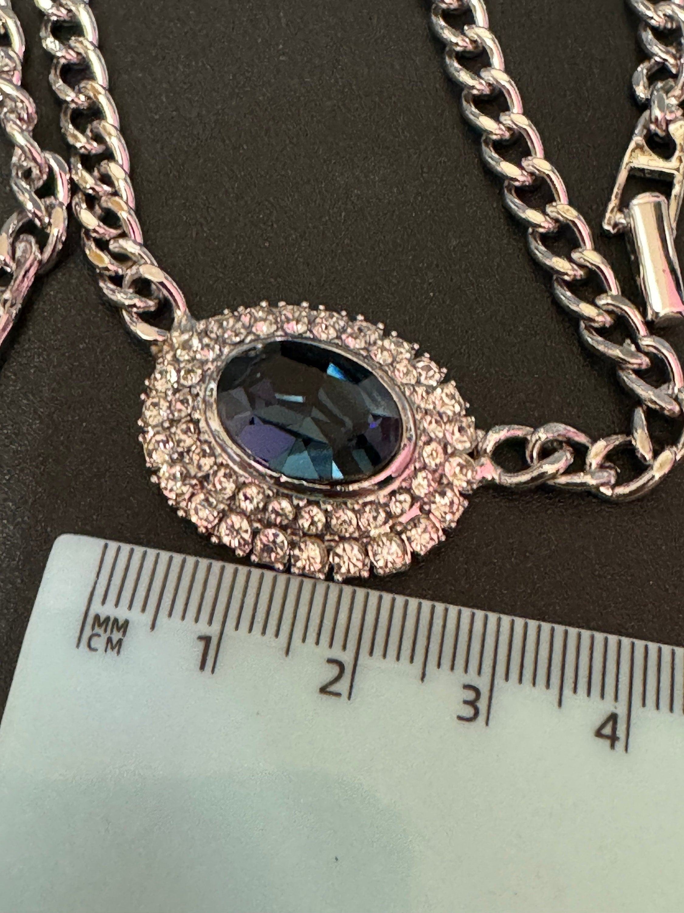 Vintage 1980s Swarovski crystal set sapphire blue cabochon and clear diamanté oval pendant necklace silver tone high end old shop stock