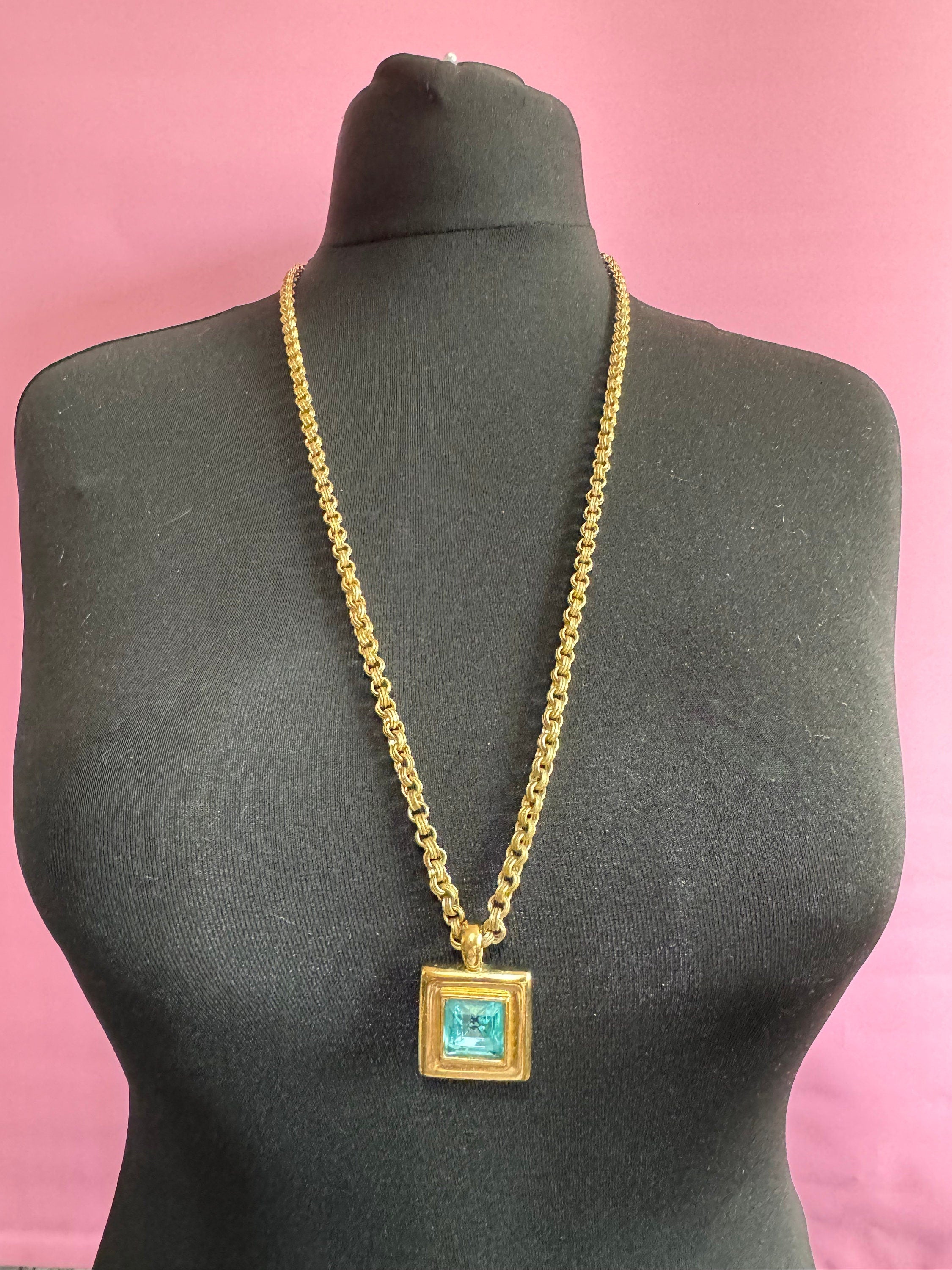 Circa 1980s designer Givenchy Paris New York heavy gold tone square turquoise blue rhinestone pendant necklace on signed 80cm toggle chain