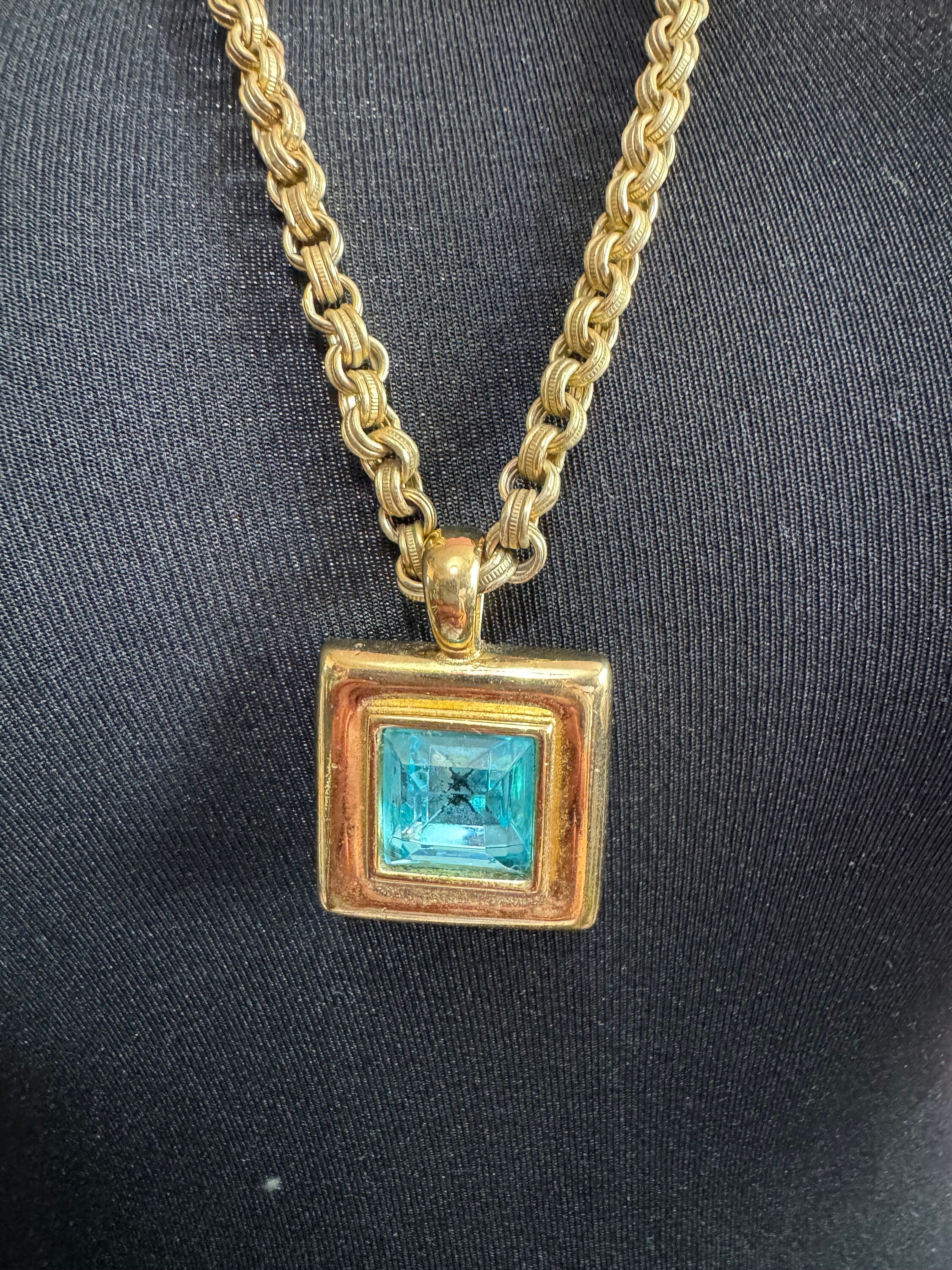 Circa 1980s designer Givenchy Paris New York heavy gold tone square turquoise blue rhinestone pendant necklace on signed 80cm toggle chain