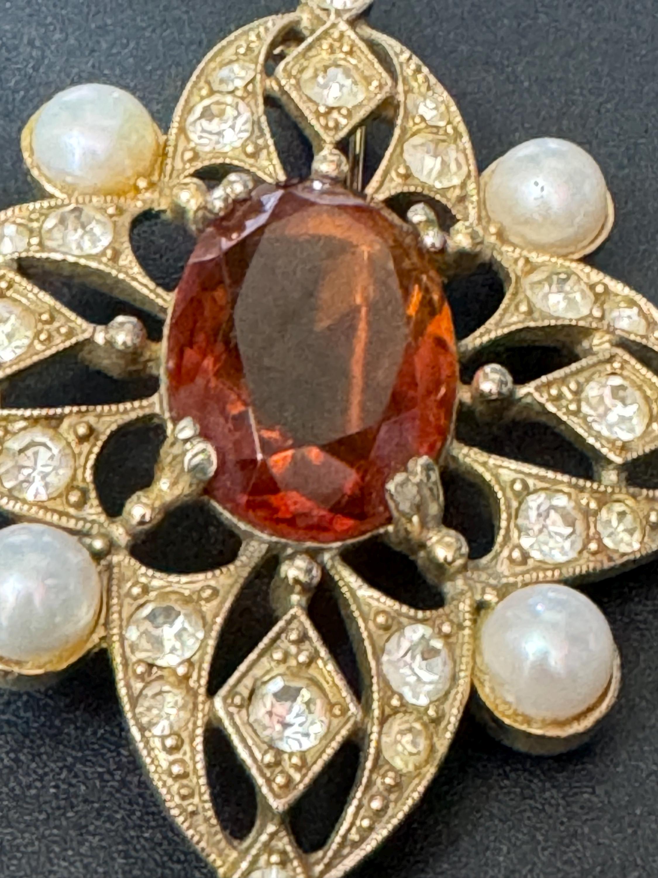 Signed Sarah Coventry Large 7cm gold tone faux pearl brooch with orange brown glass rhinestone