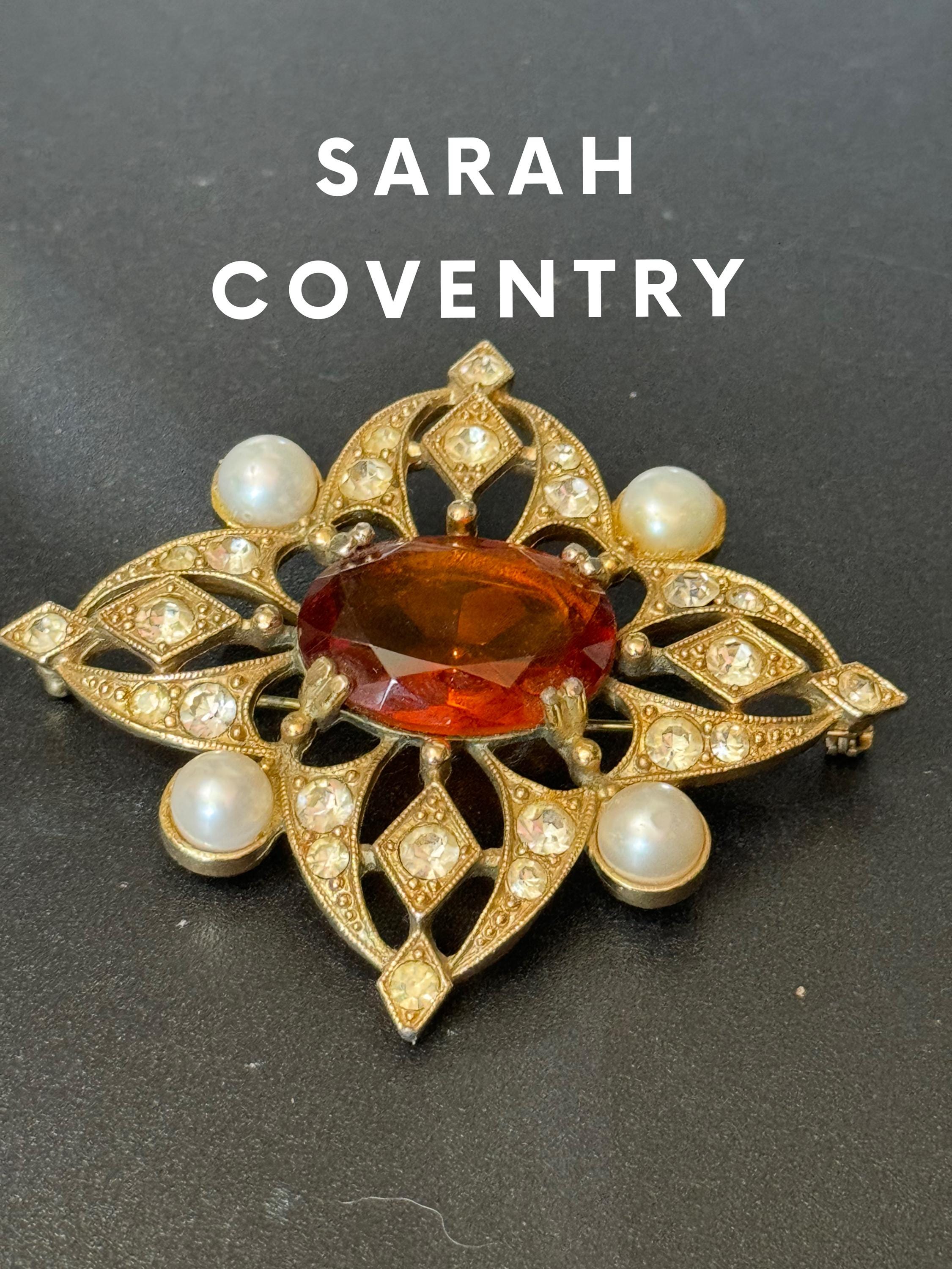 Signed Sarah Coventry Large 7cm gold tone faux pearl brooch with orange brown glass rhinestone