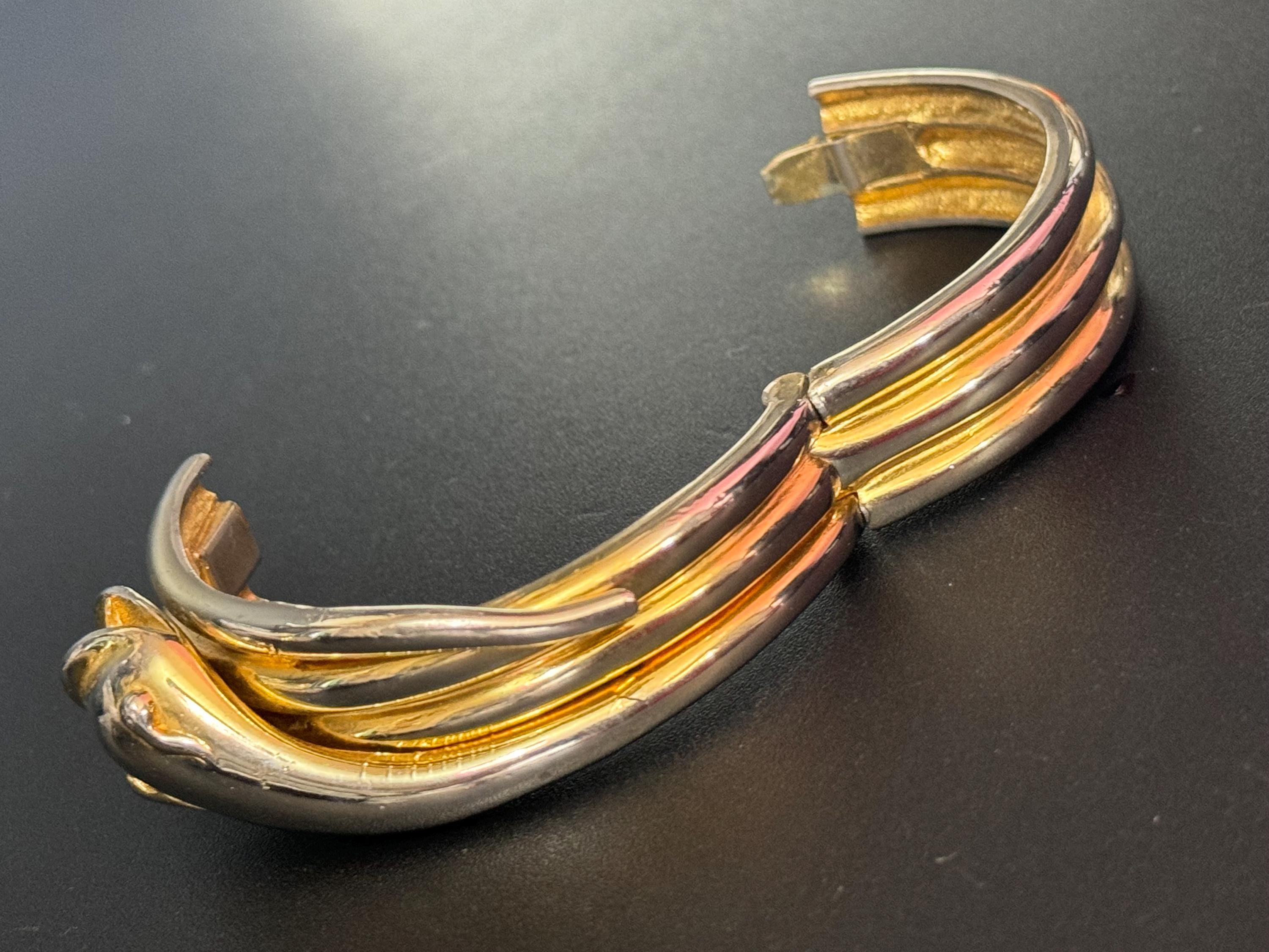 Signed butler and Wilson gold tone snake head clamper bangle cuff bracelet some colour fade