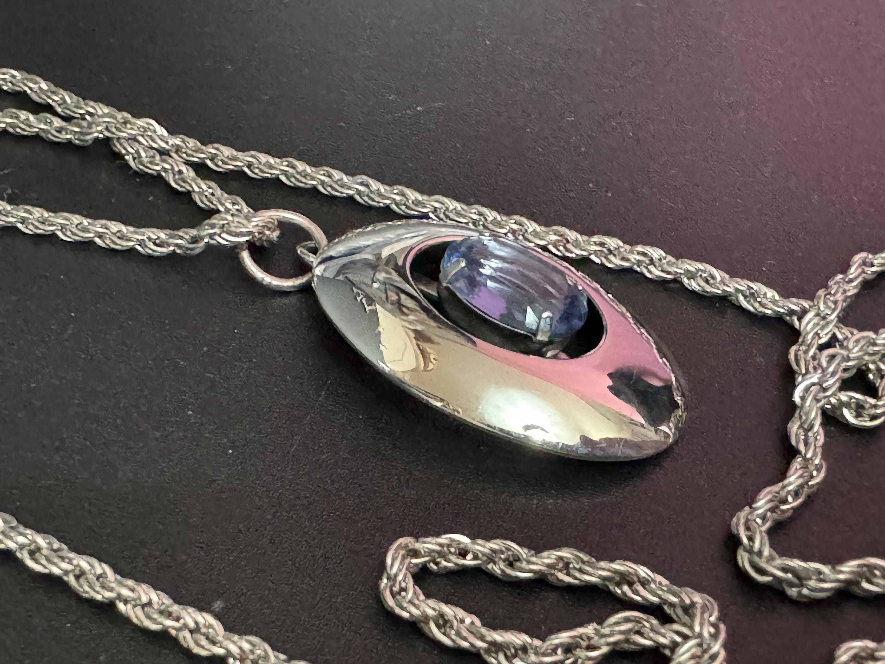 Vintage Modernist silver tone stainless Steel pendant necklace with central amethyst purple rhinestone Mid Century 1960s 1970s