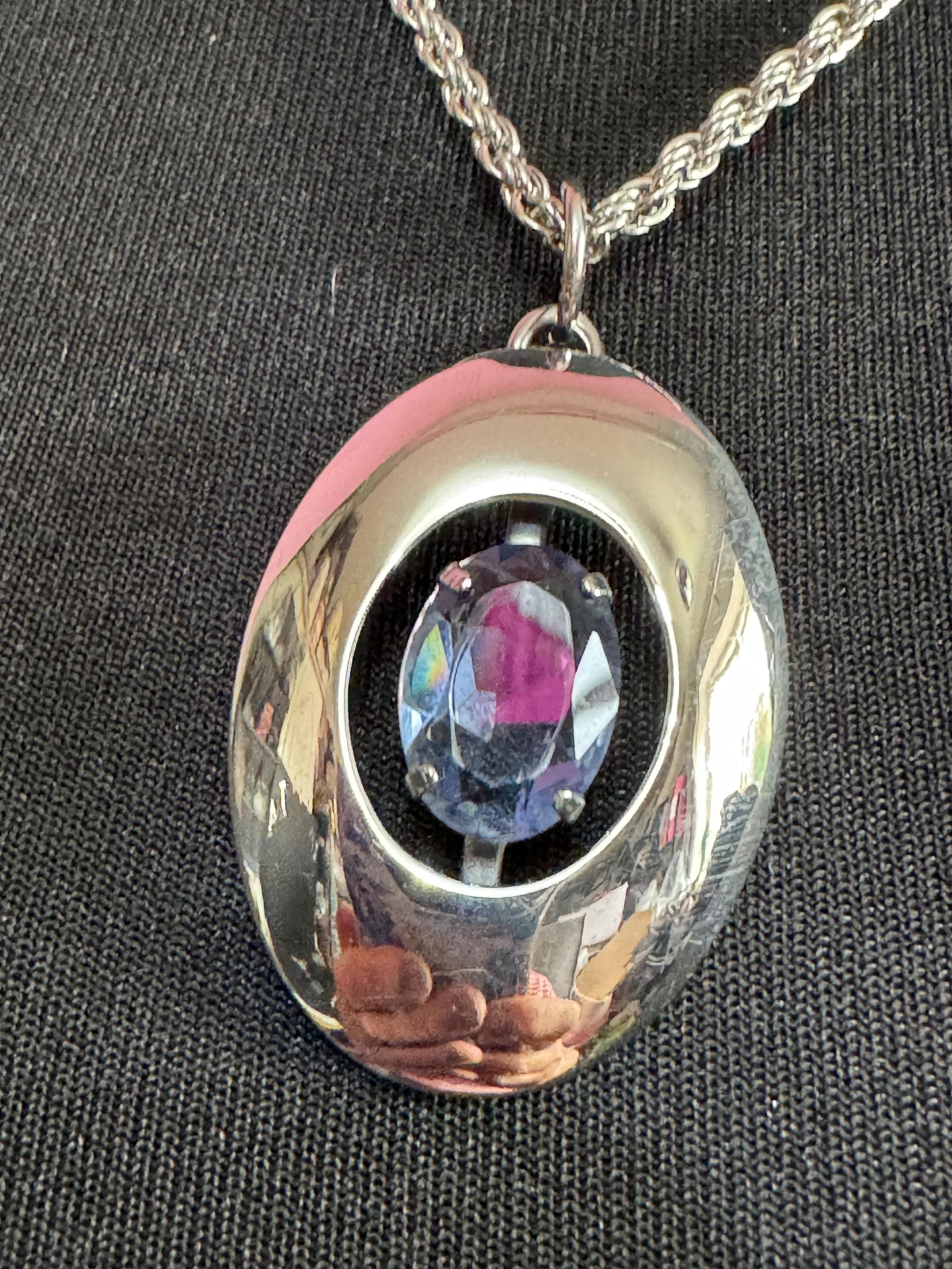 Vintage Modernist silver tone stainless Steel pendant necklace with central amethyst purple rhinestone Mid Century 1960s 1970s