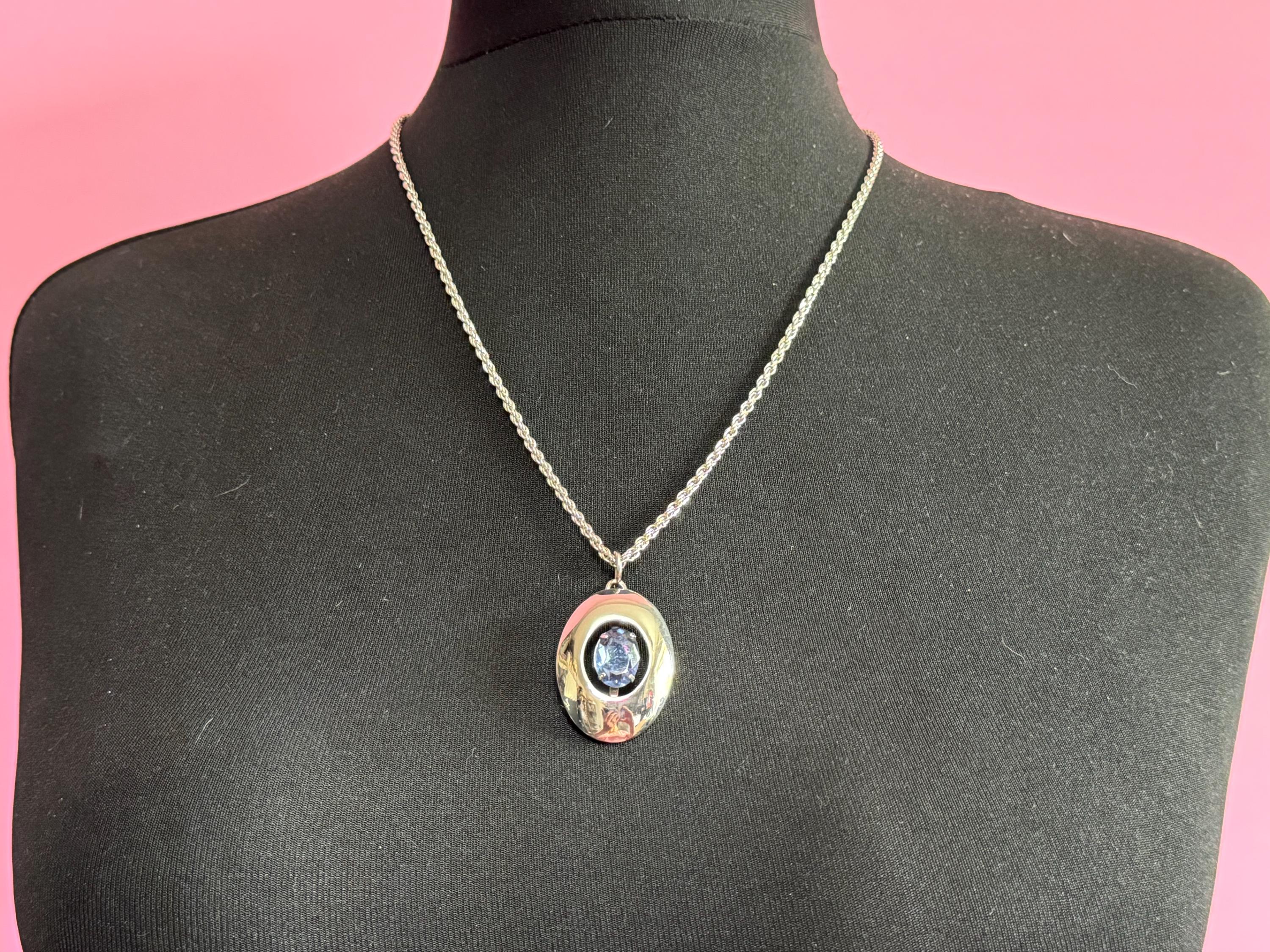 Vintage Modernist silver tone stainless Steel pendant necklace with central amethyst purple rhinestone Mid Century 1960s 1970s