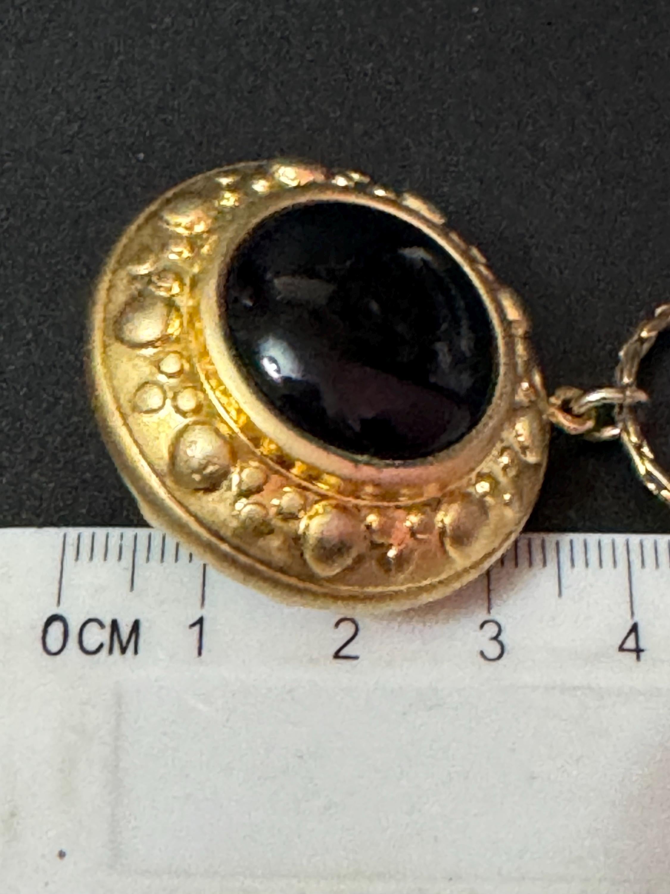 retro Etruscan style Matt yellow gold tone round hollow disc pendant with black central cabochon 70cm Ornate chain