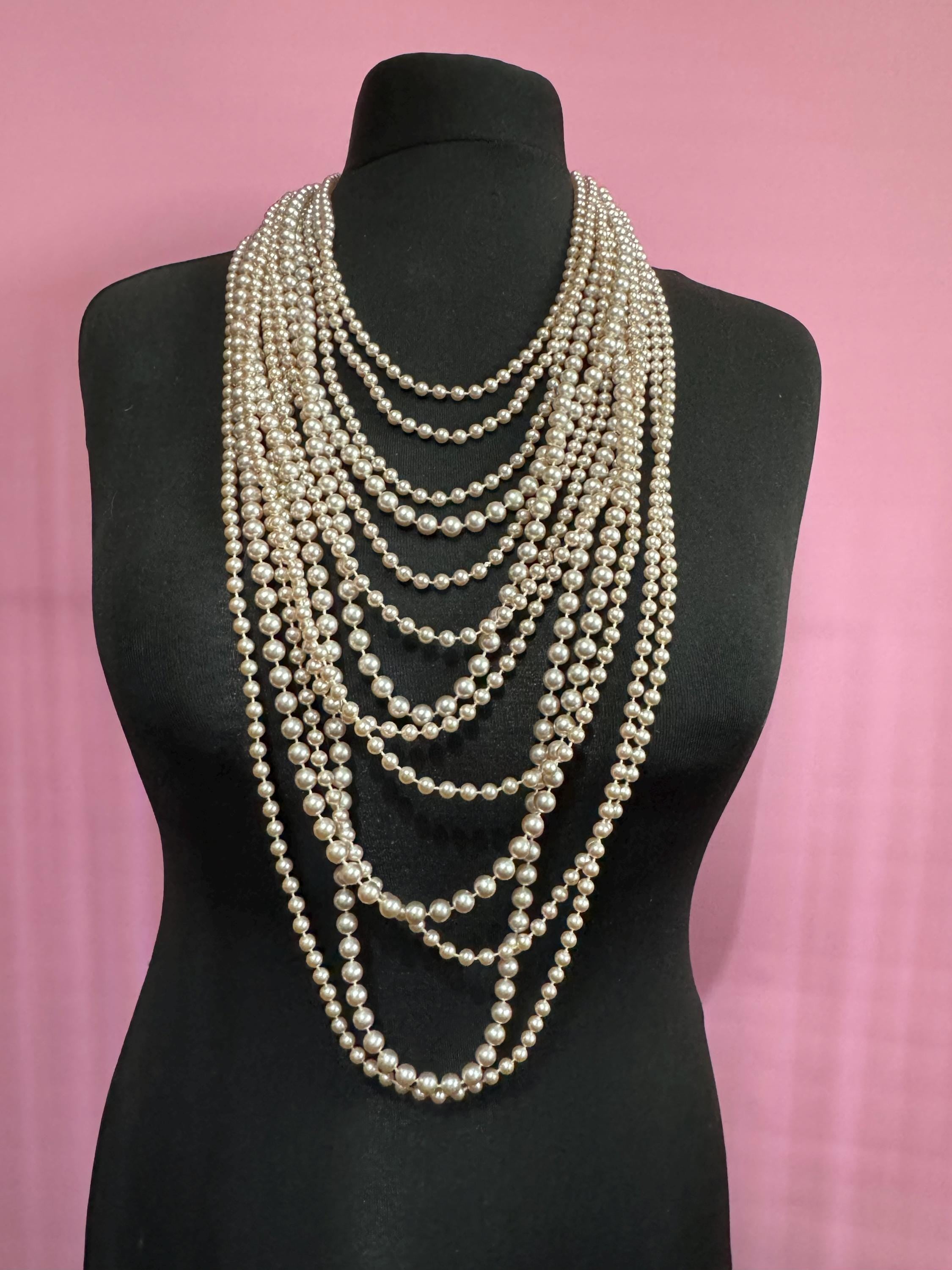 retro statement Ivory cream plastic beaded Pearl multi strand waterfall necklace with silver tone clasp showstopper