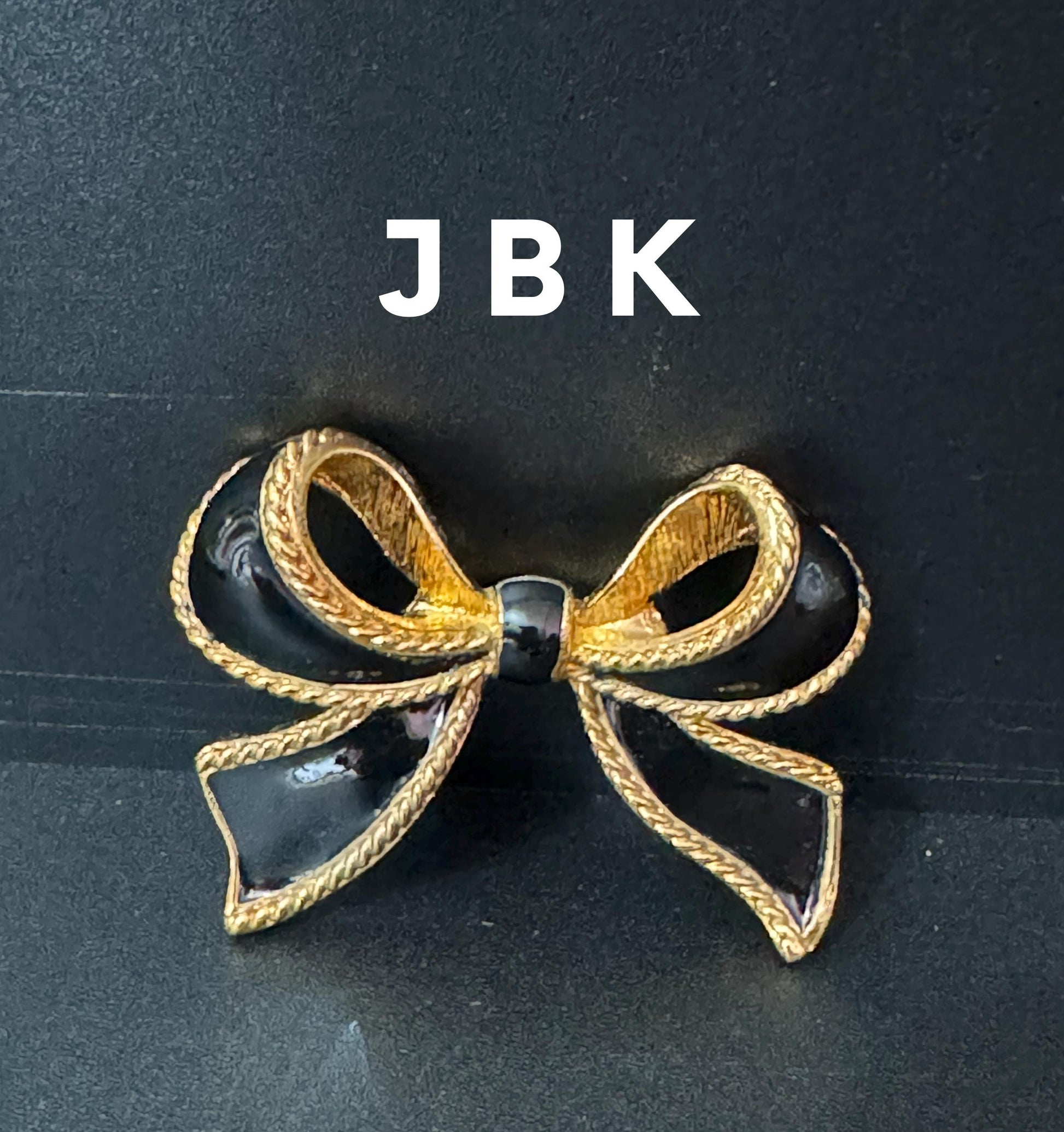 Signed JBK vintage gold plated black enamel classic bow style Scarf Clip ring