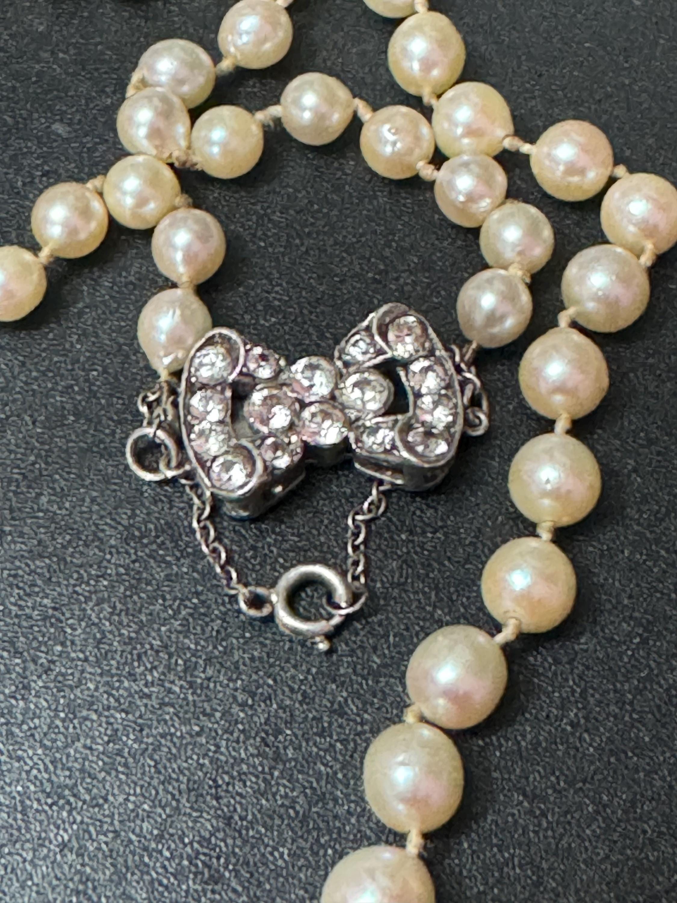 signed SCP Ciro faux pearl necklace with ornate diamanté bow clasp 54cm