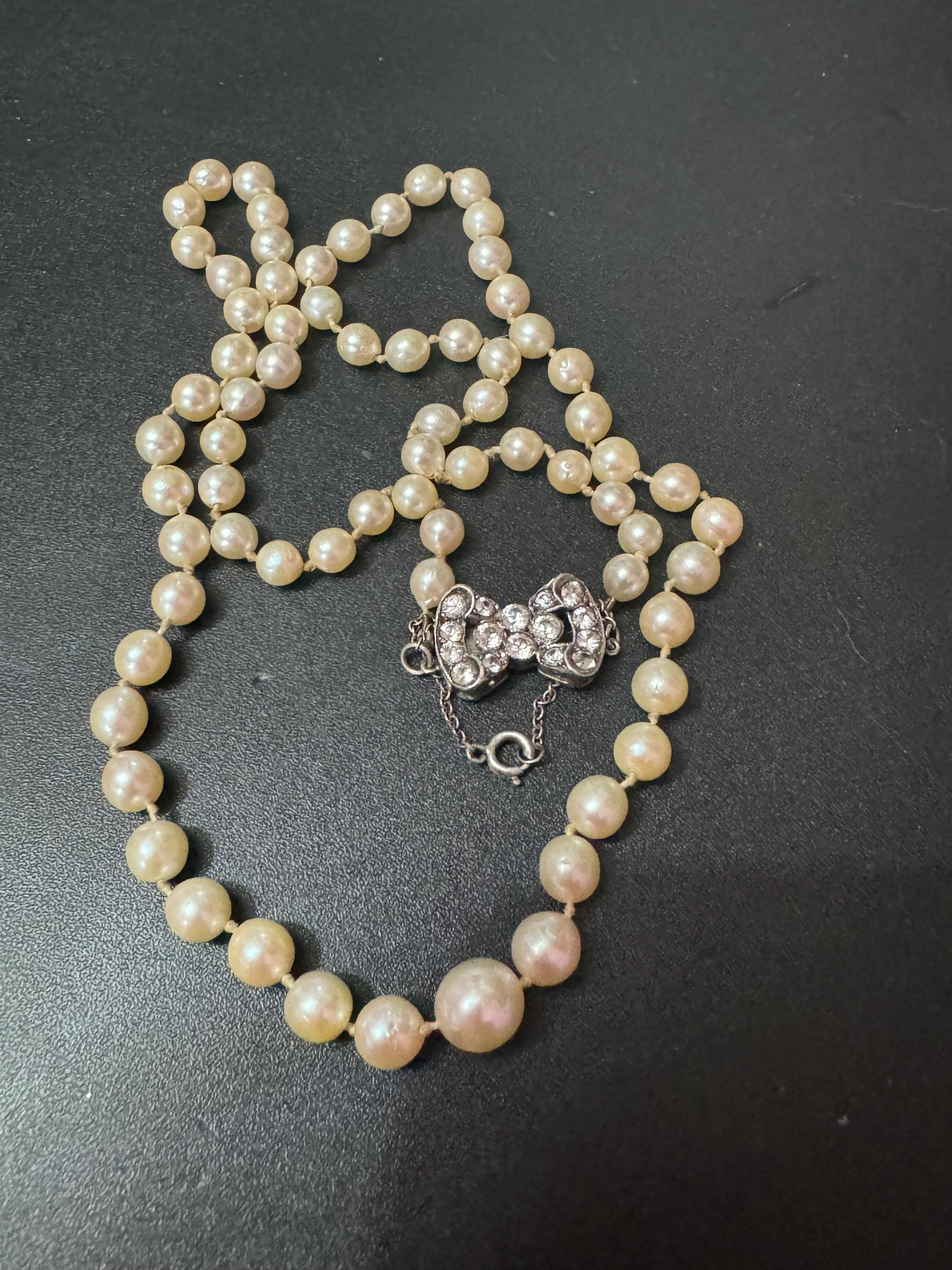 signed SCP Ciro faux pearl necklace with ornate diamanté bow clasp 54cm