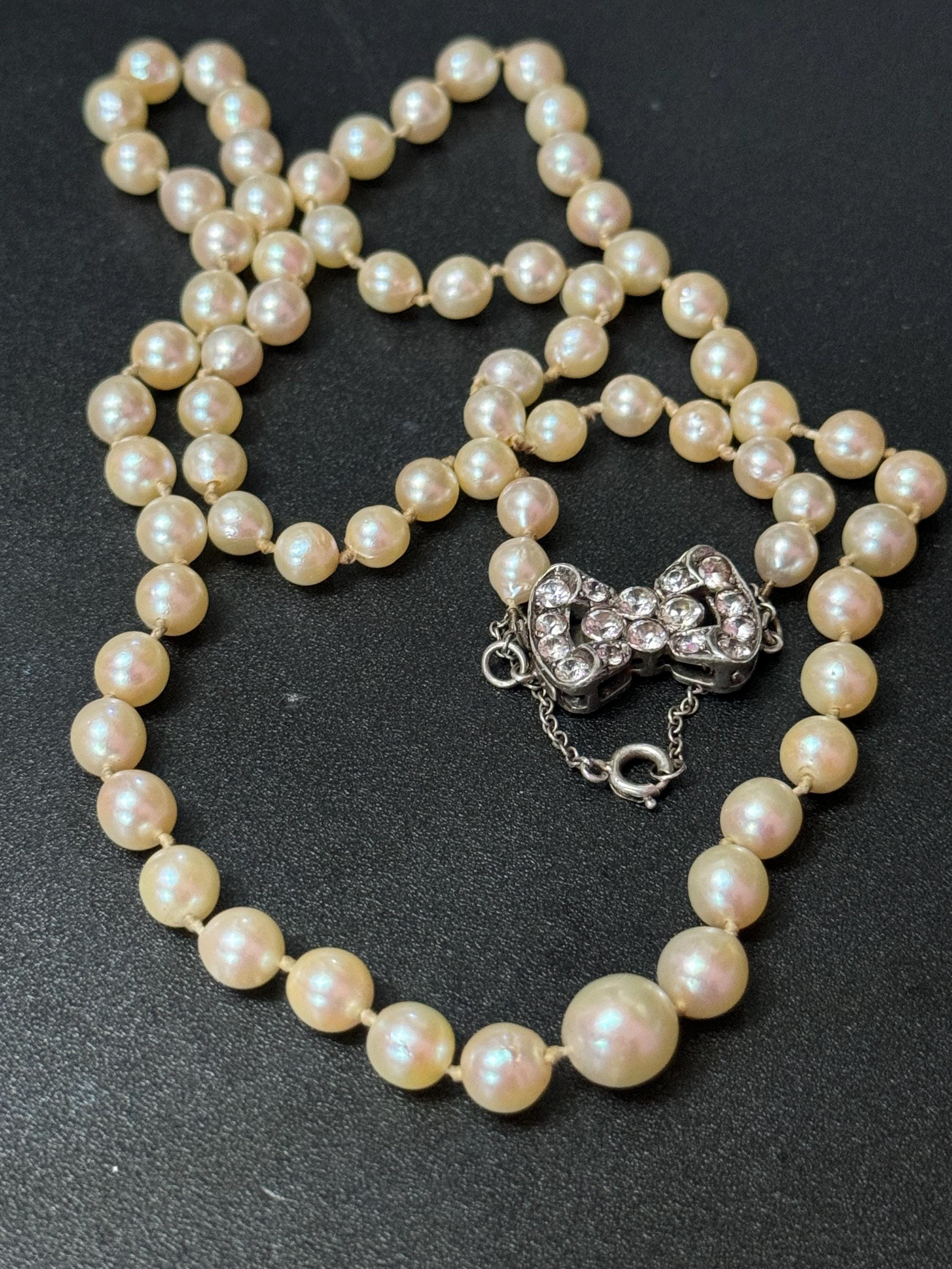 signed SCP Ciro faux pearl necklace with ornate diamanté bow clasp 54cm