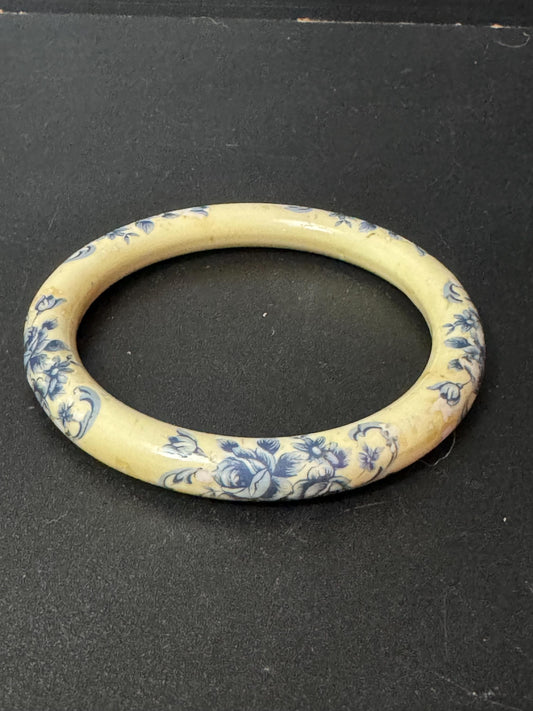 Antique ceramic Art Deco Period Cream bangle bracelet transfer printed with blue floral roses