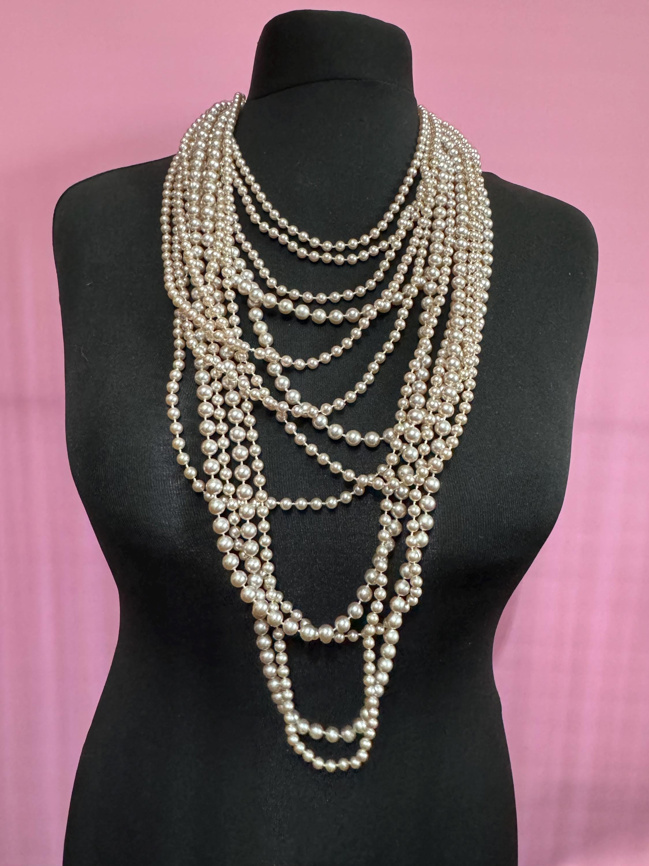 retro statement Ivory cream plastic beaded Pearl multi strand waterfall necklace with silver tone clasp showstopper