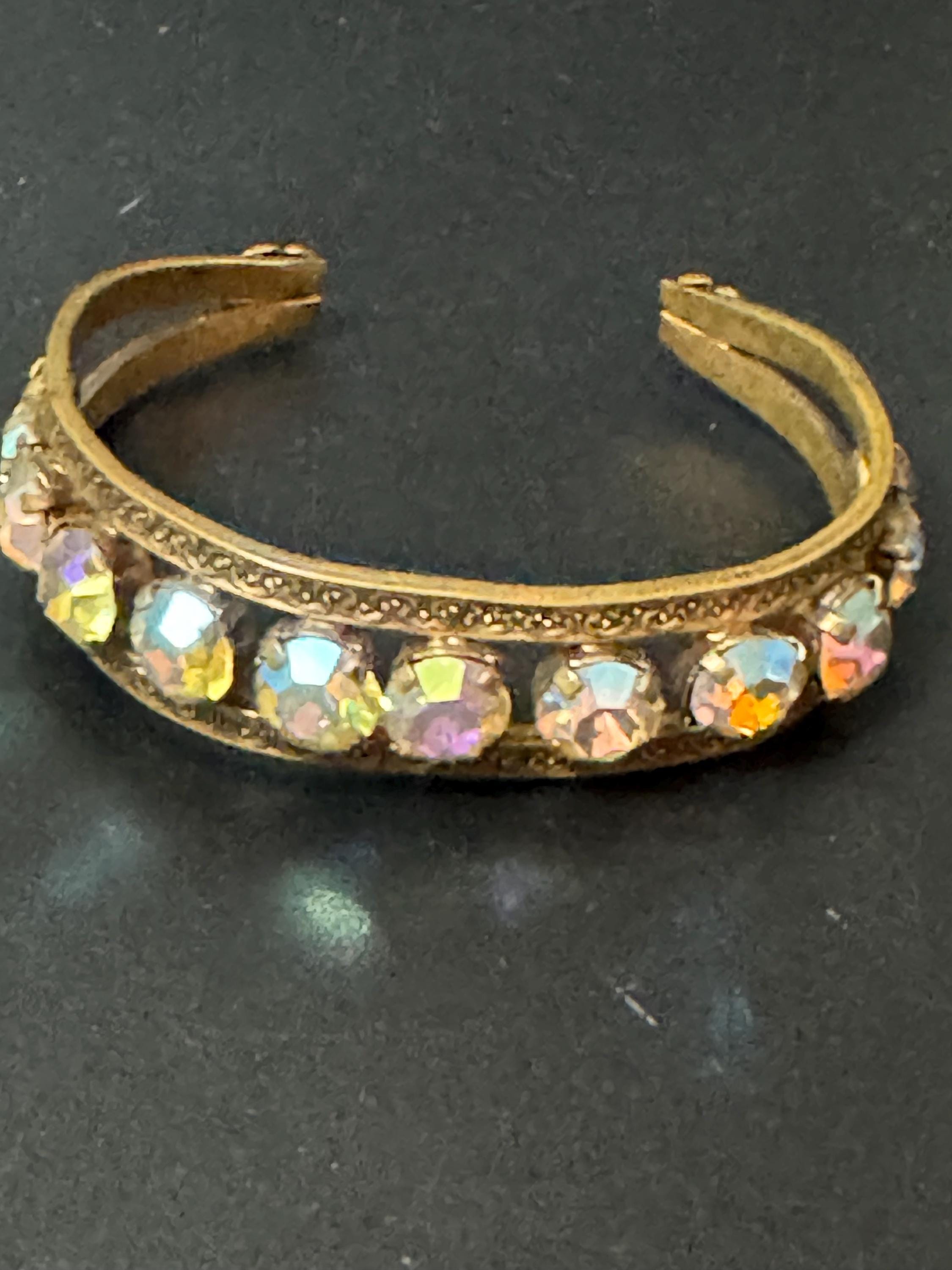 Nice old Vintage gold tone AB Aurora borealis rhinestone glass paste cuff bracelet