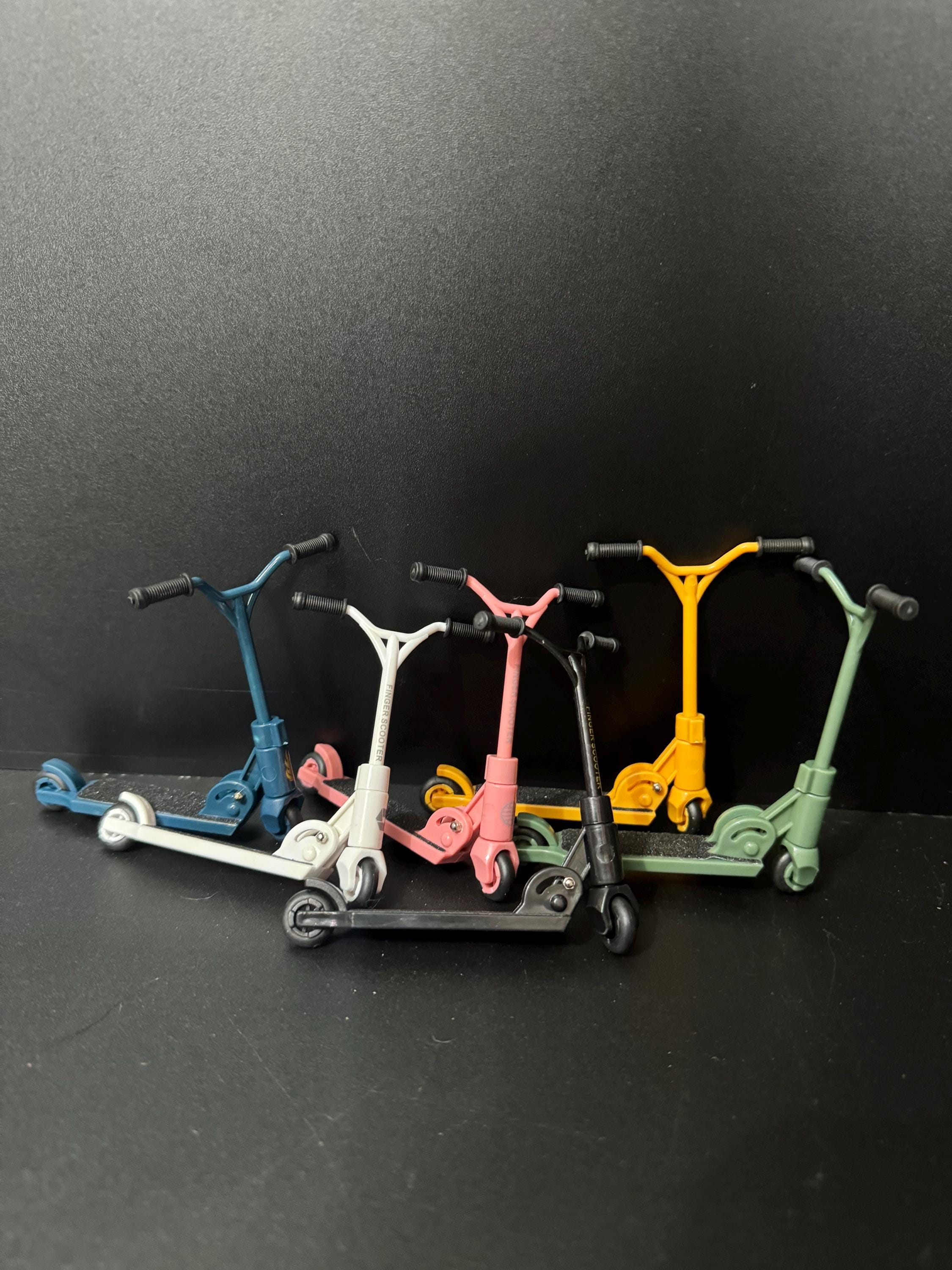 Miniature folding scooter cake topper decoration choice of colours plastic finger operated Childs toy