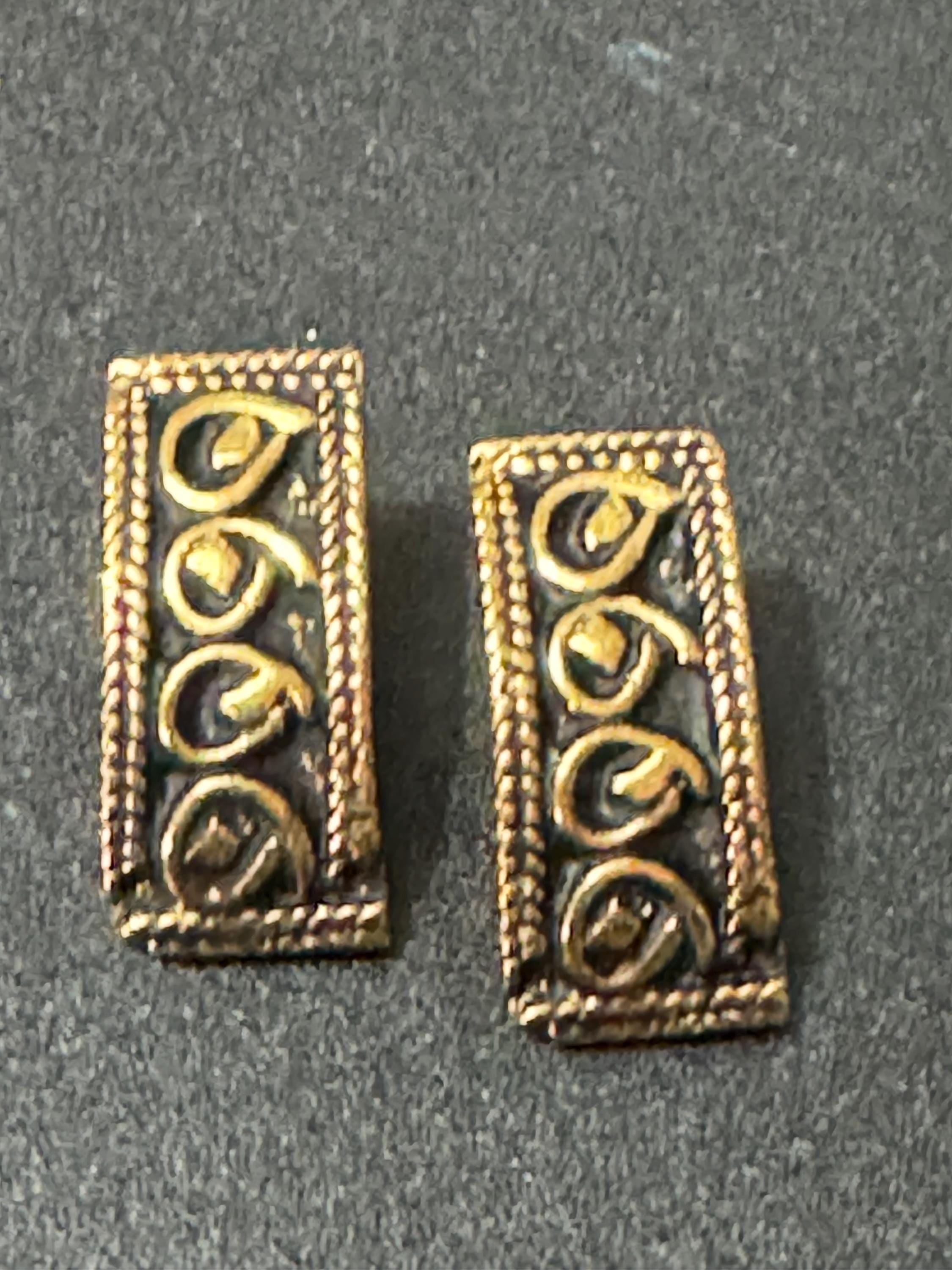 Signed Charles Duret French designer pair of vintage gold tone modernist textured pierced earrings from France