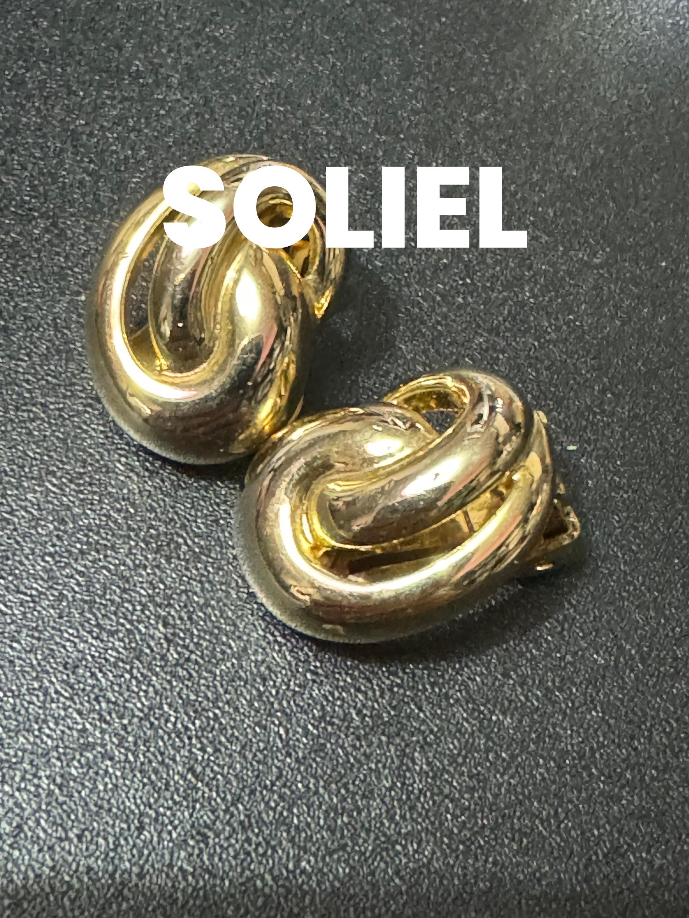 Small Signed SOLIEL Vintage 1980s gold tone clip on modernist knot earrings