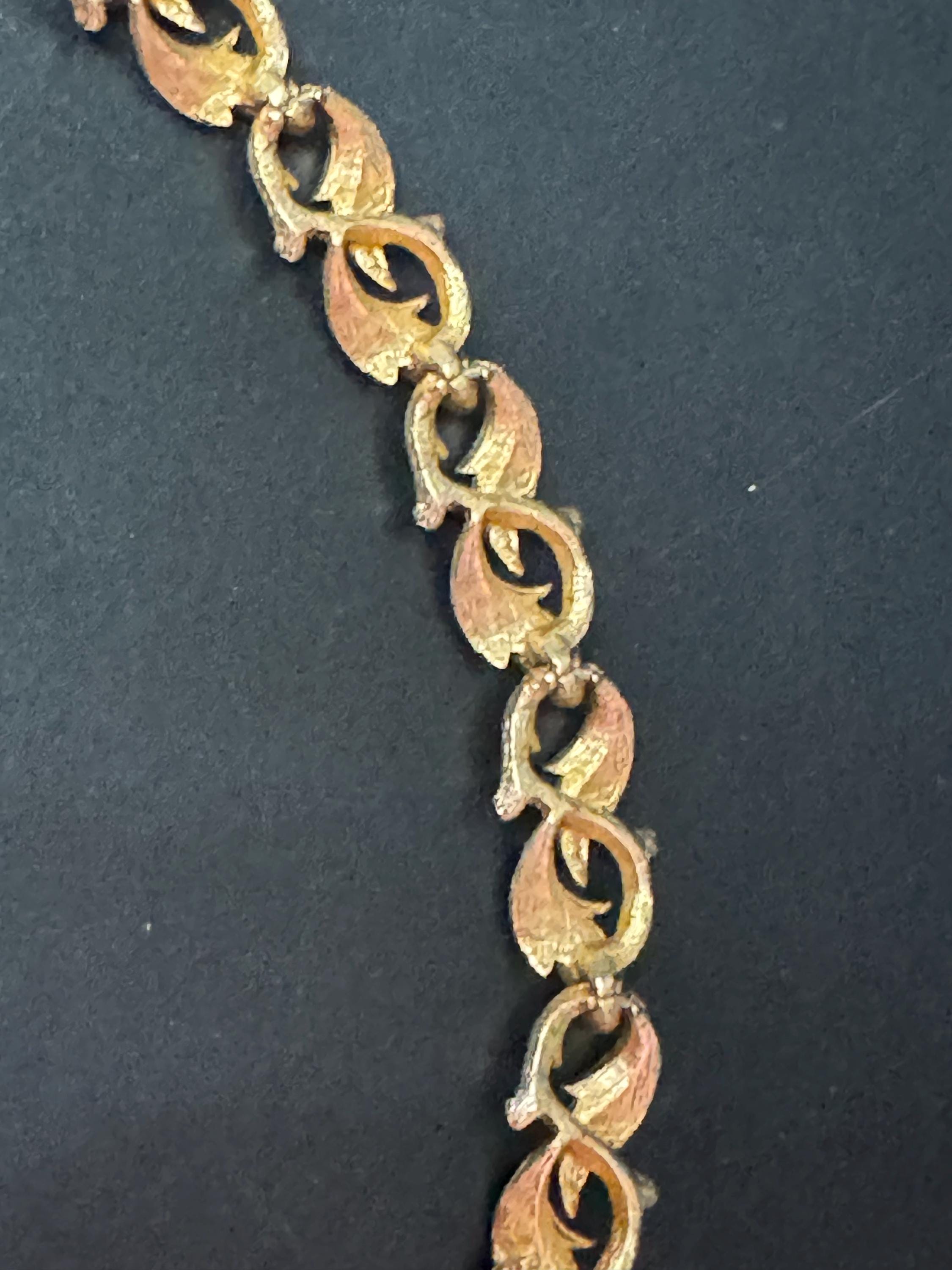 Vintage gold tone mid century metal textured panel link leaf bracelet