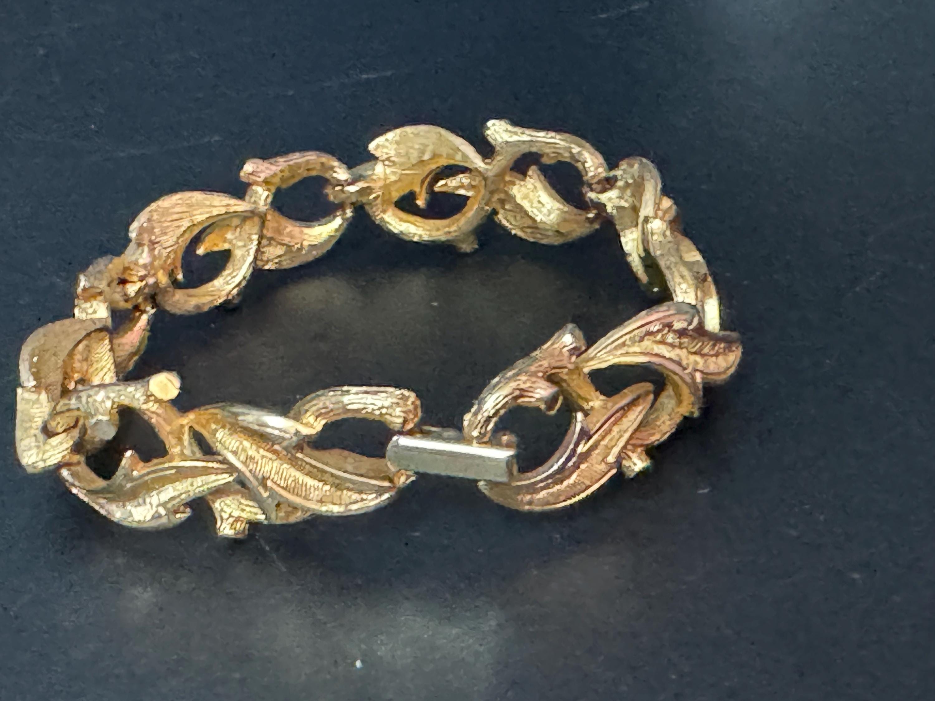 Vintage gold tone mid century metal textured panel link leaf bracelet