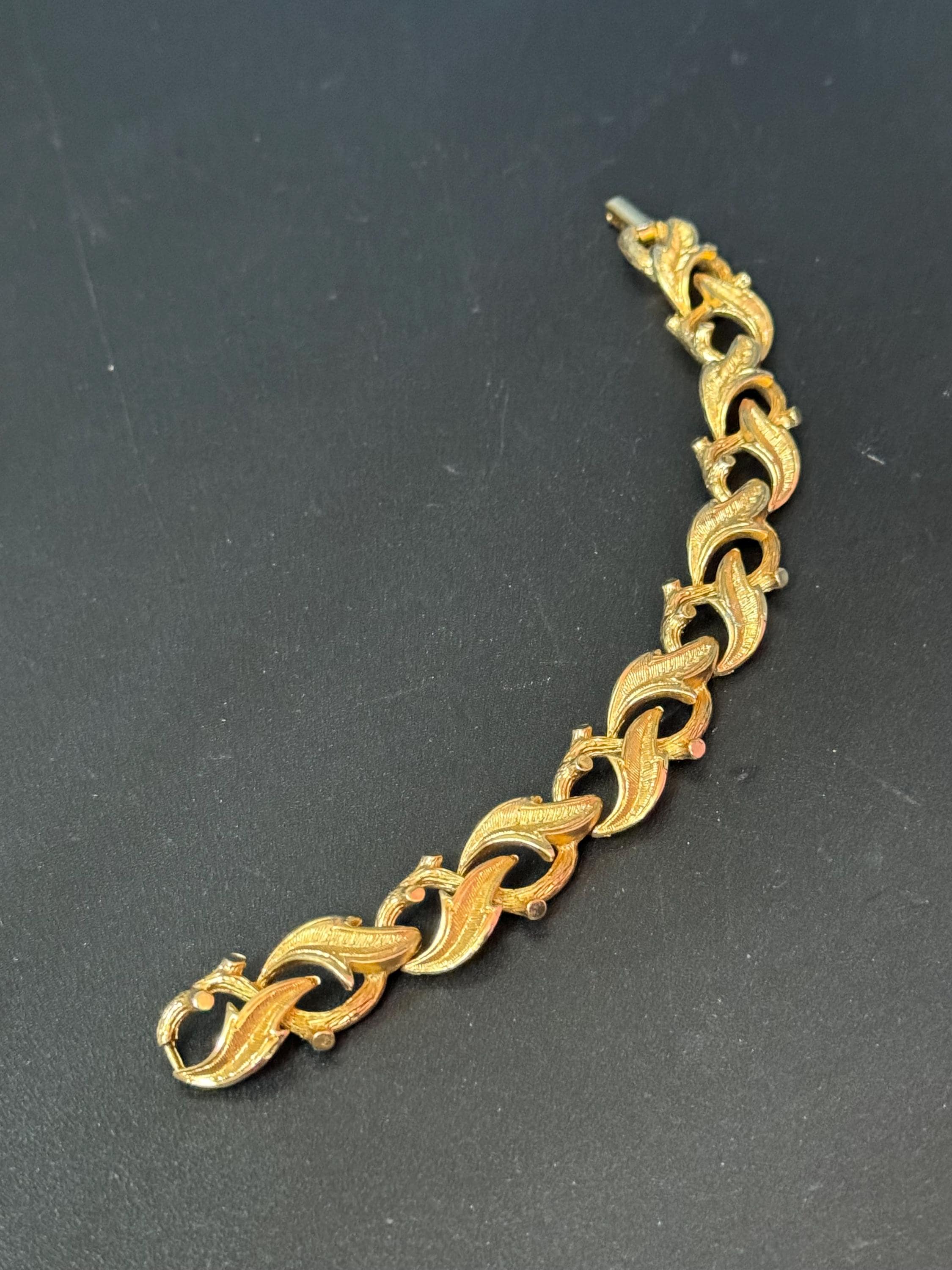 Vintage gold tone mid century metal textured panel link leaf bracelet