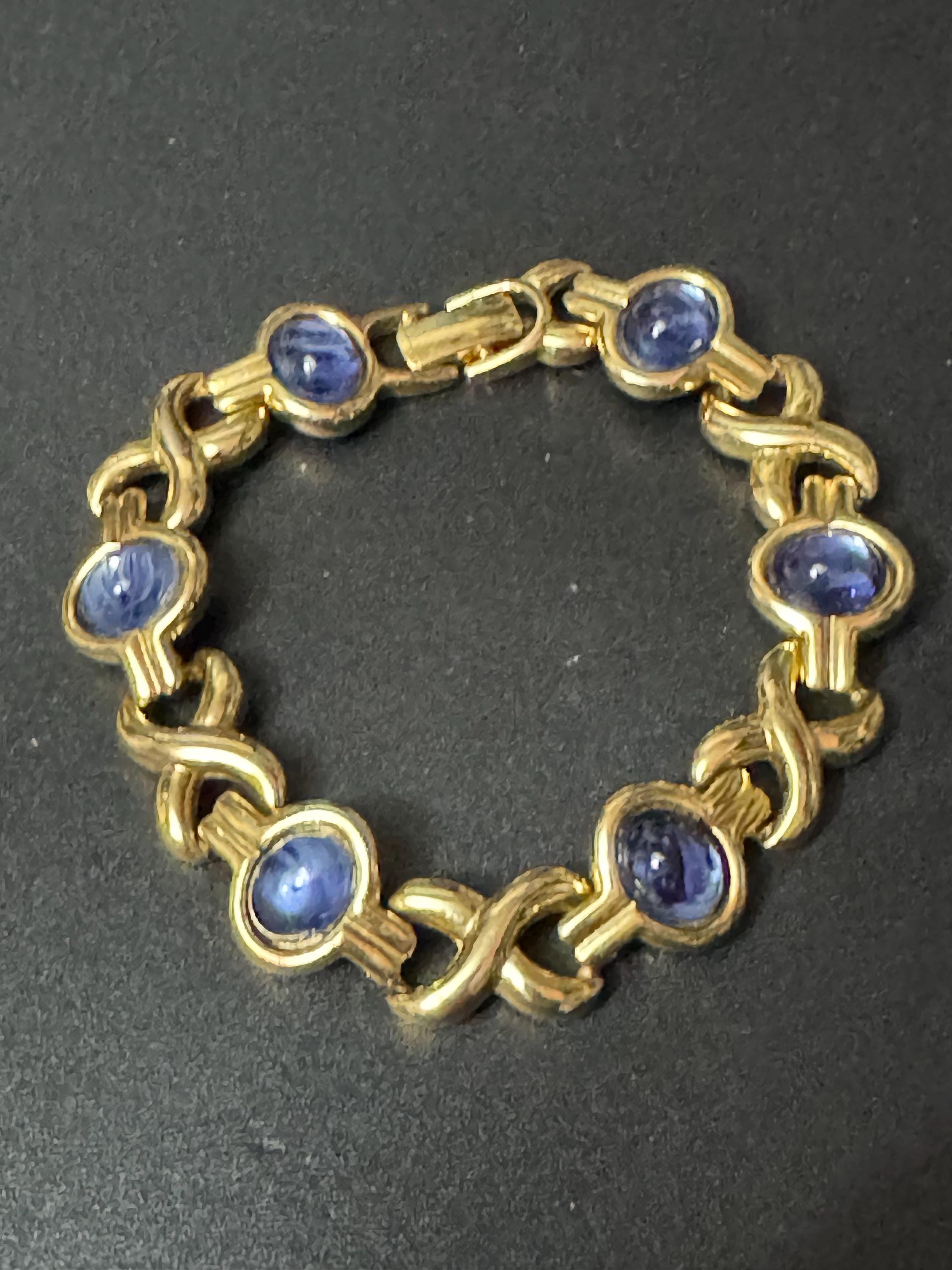 Vintage sapphire blue glass cabochon bezel set gold tone tennis bracelet