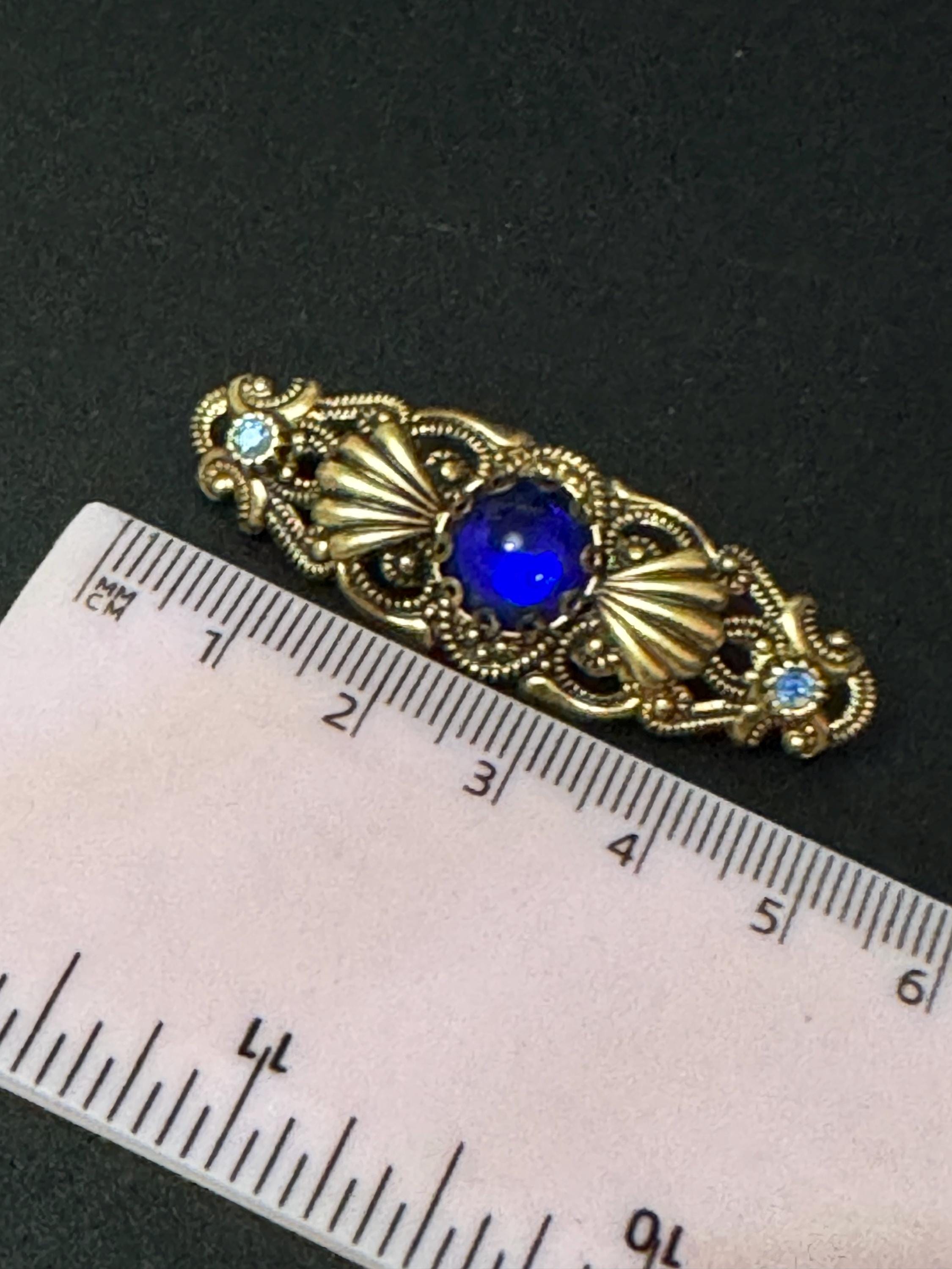 Vintage czech stamped metal copper tone brass bright blue glass cabochon brooch