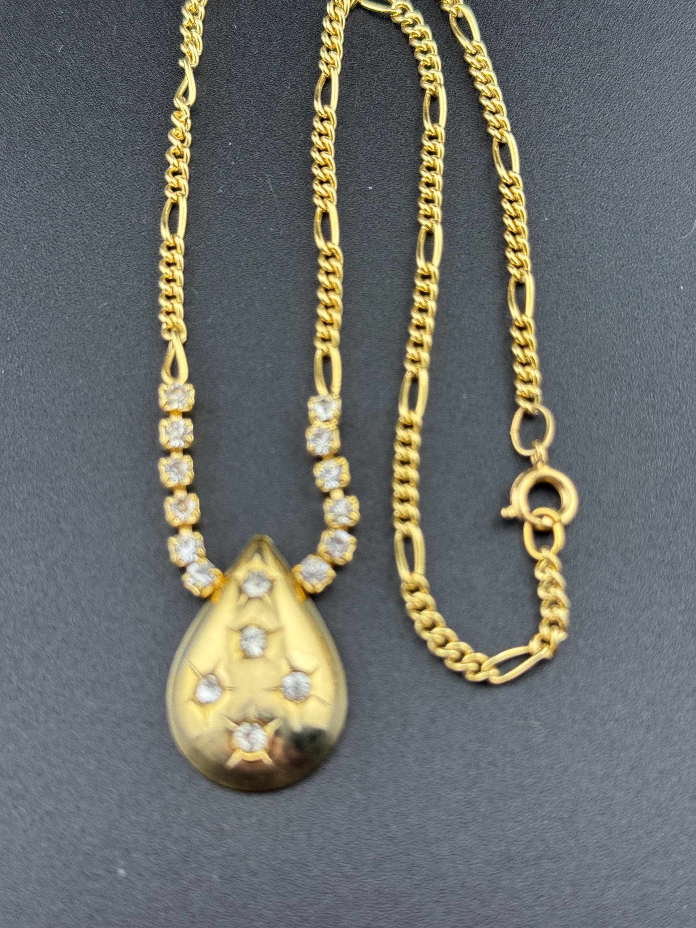 Vintage 1990s gold tone diamanté figaro chain link necklace with star cut rhinestone teardrop pendant