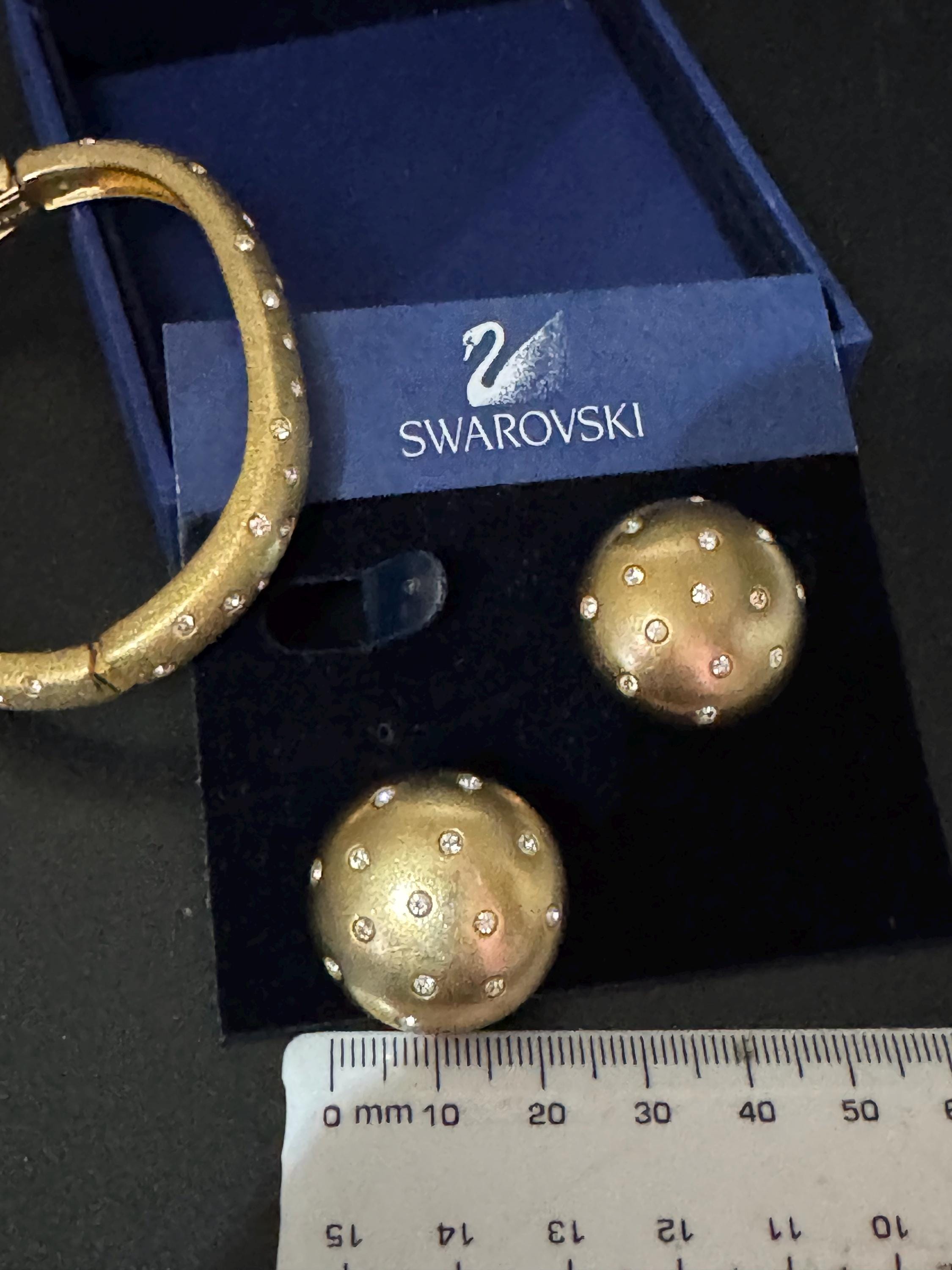 Jewellery set signed swan Swarovski crystal pave set Matt gold plated clamper bangle and matching button clip on earrings