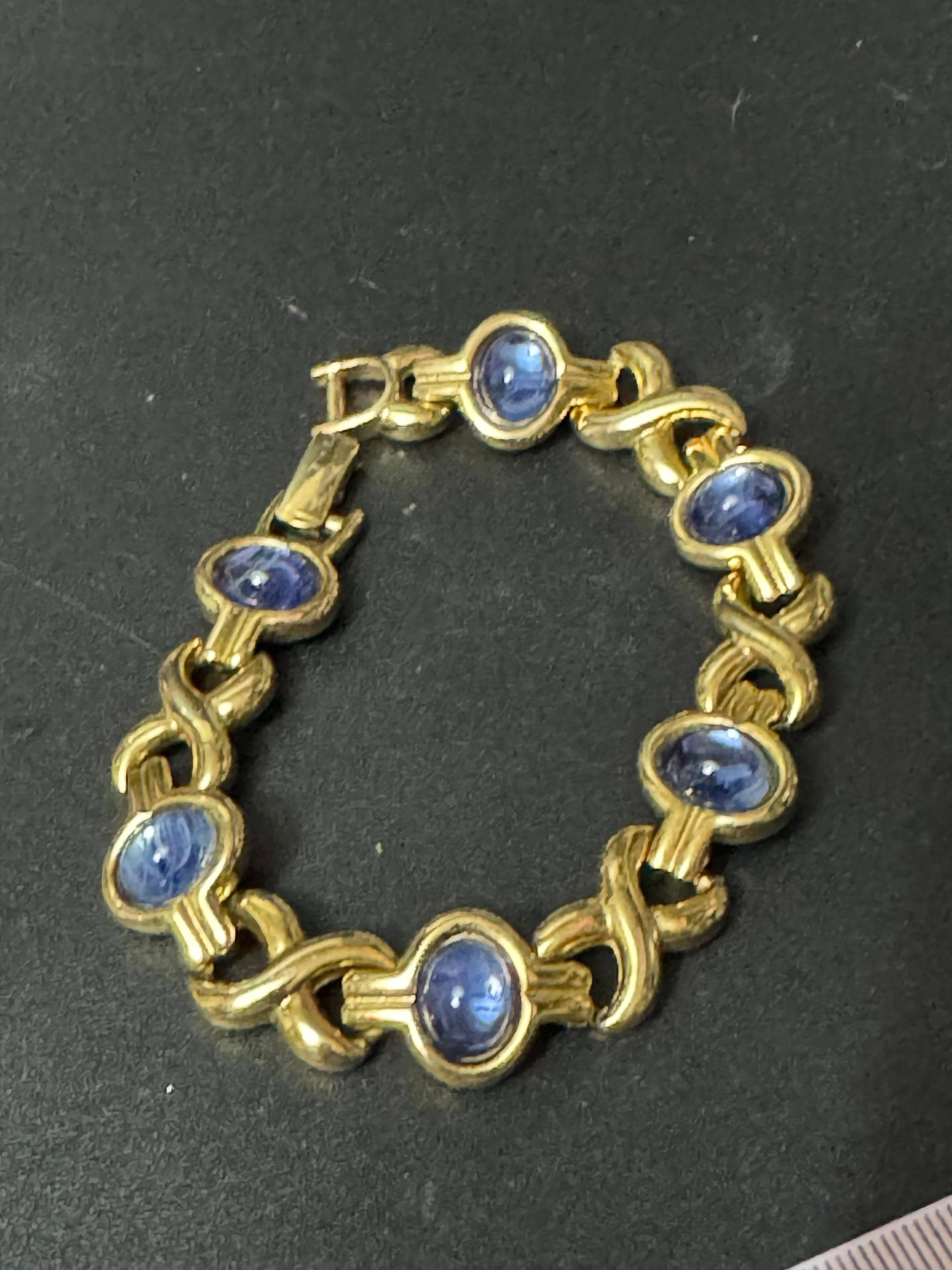 Vintage sapphire blue glass cabochon bezel set gold tone tennis bracelet