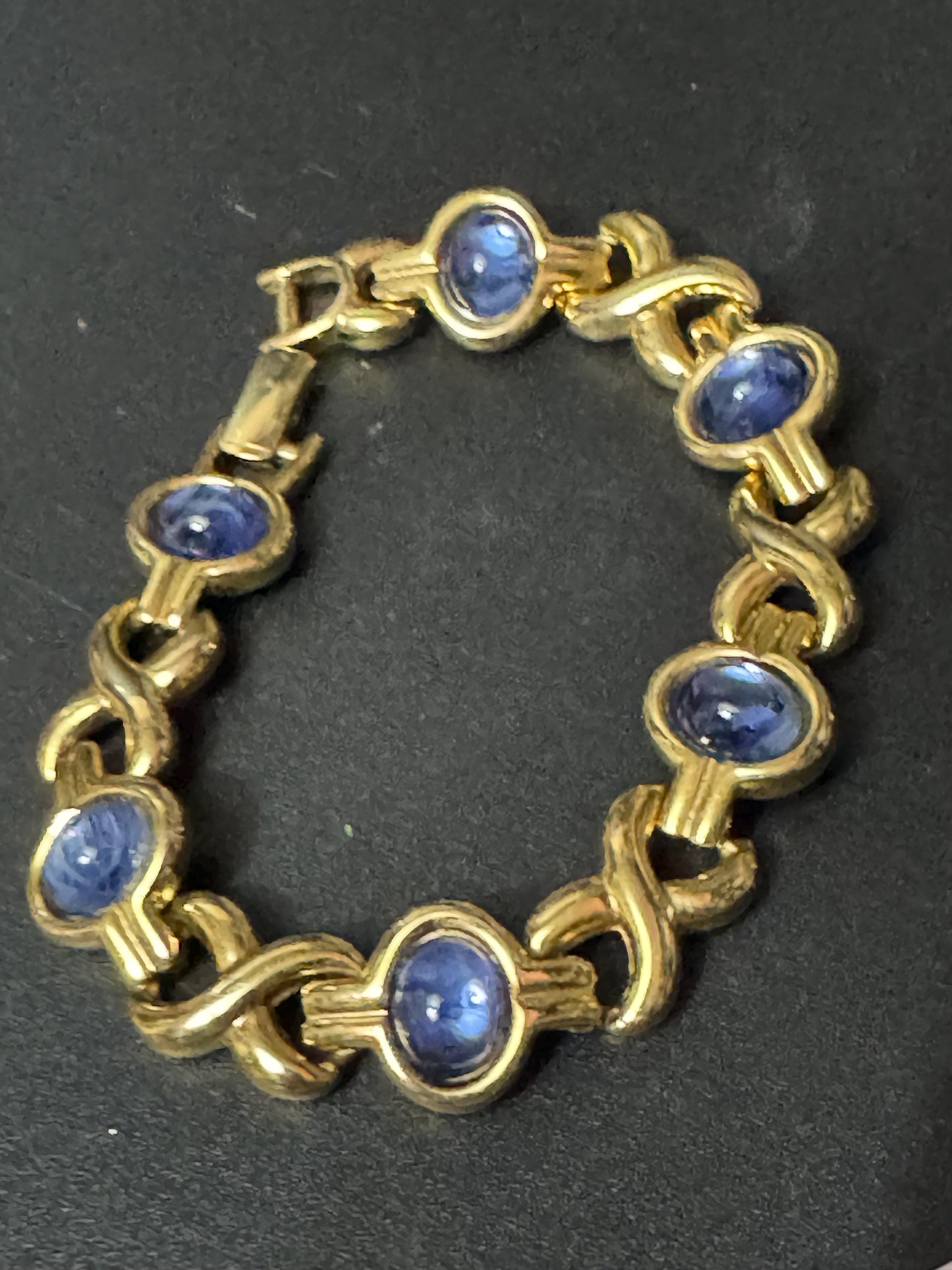 Vintage sapphire blue glass cabochon bezel set gold tone tennis bracelet