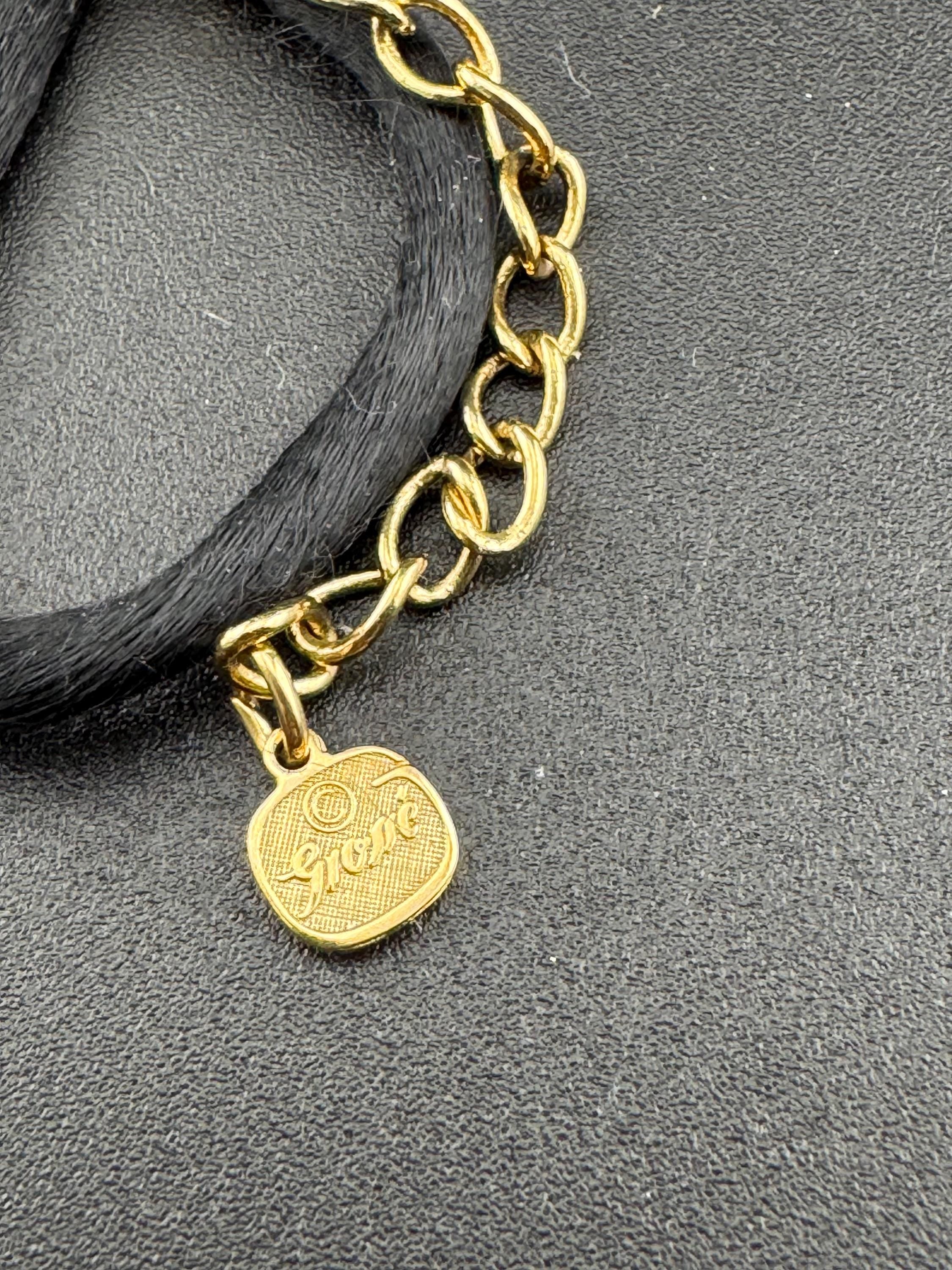 signed GROSSE Designer retro gold plated pendant necklace on black fabric cord chain