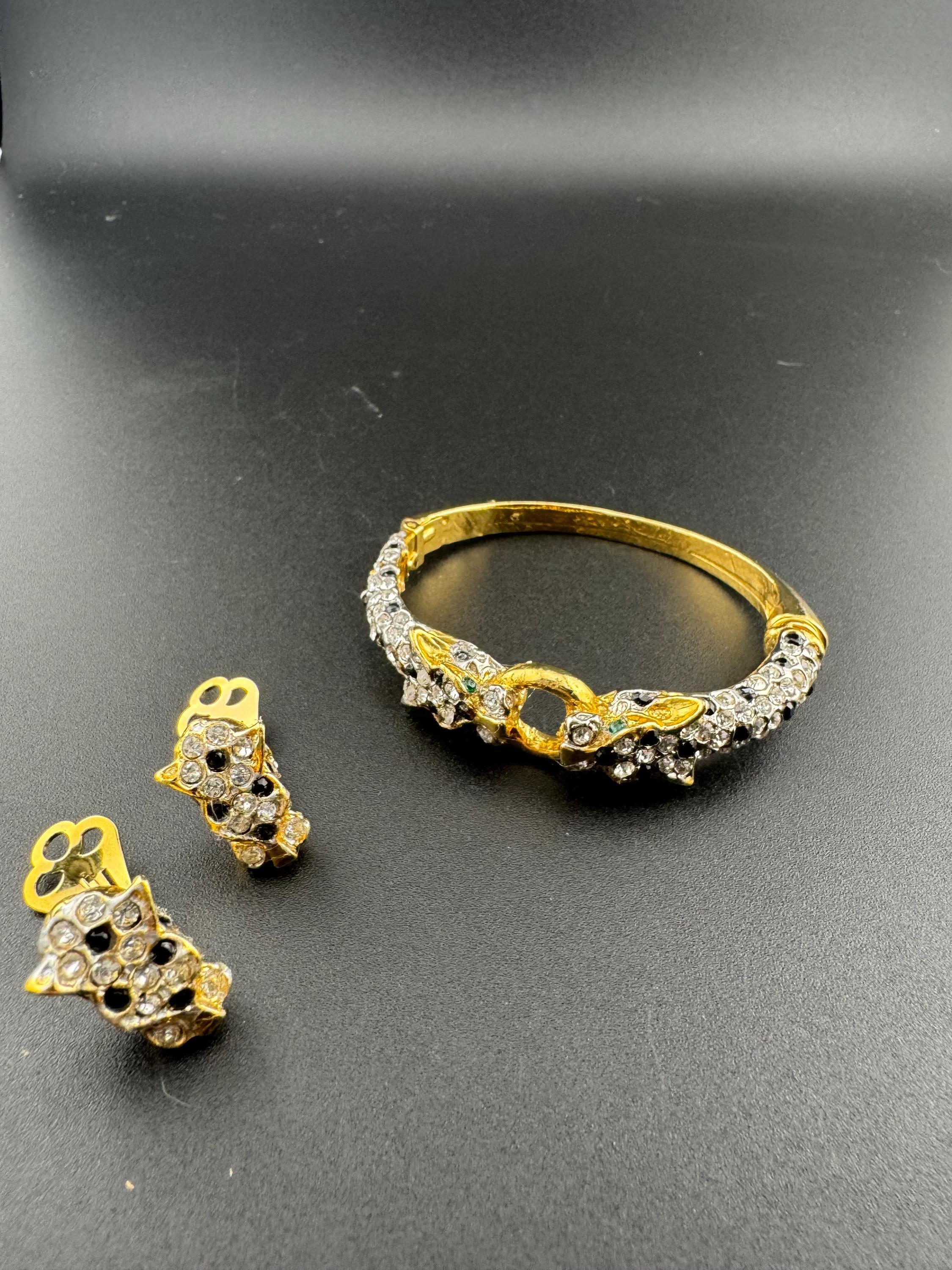 BIG CAT diamanté clamper bangle hinged rhinestone crystal bracelet and matching clip on earrings tiger panther gold tone 1980s vintage