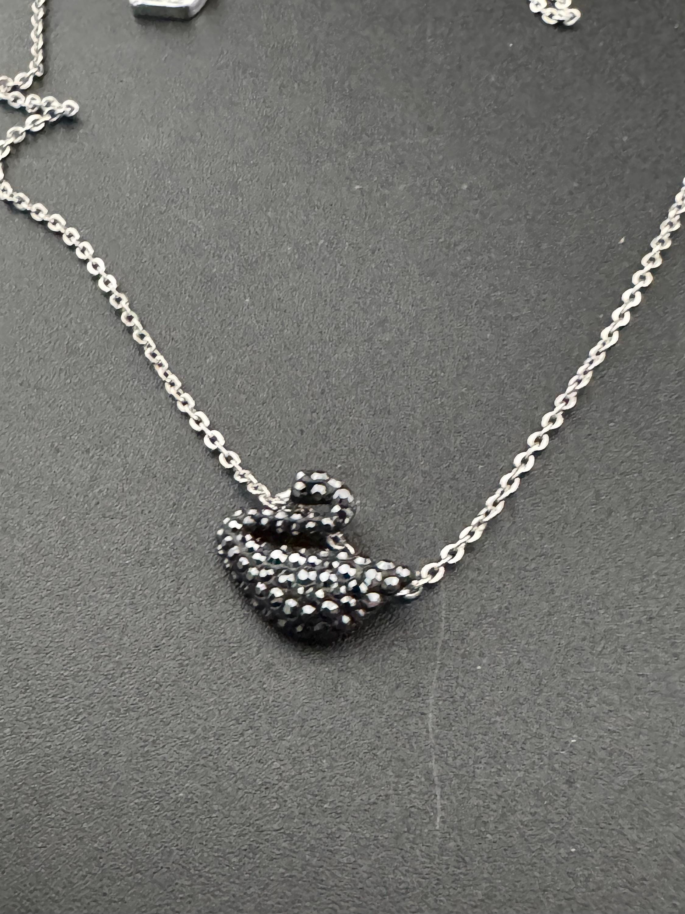 Signed Swarovski crystal silver tone black diamanté swan dainty pendant necklace