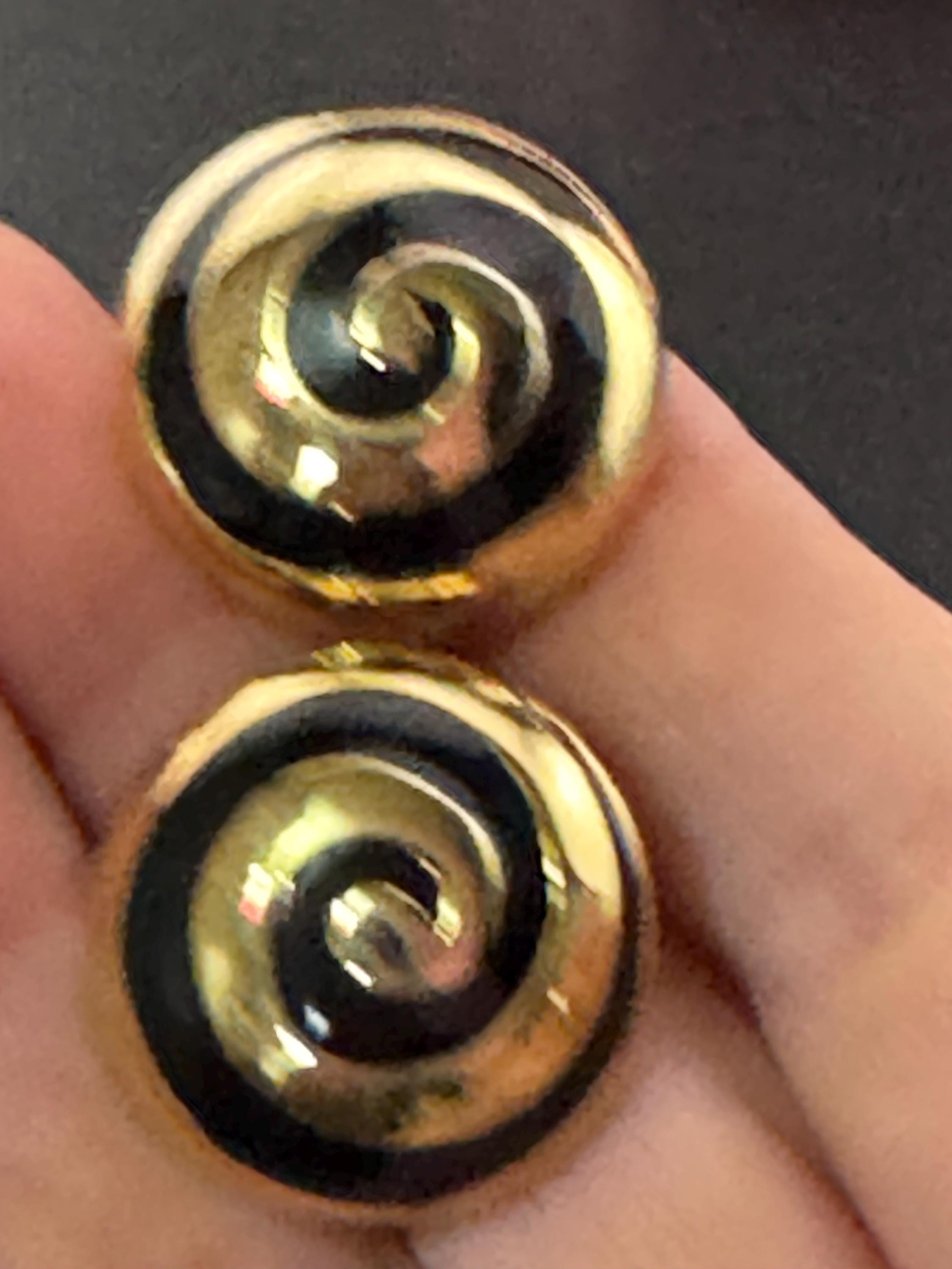 Signed Joan Collins Vintage round black enamel gold tone classic swirl button clip on stud earrings