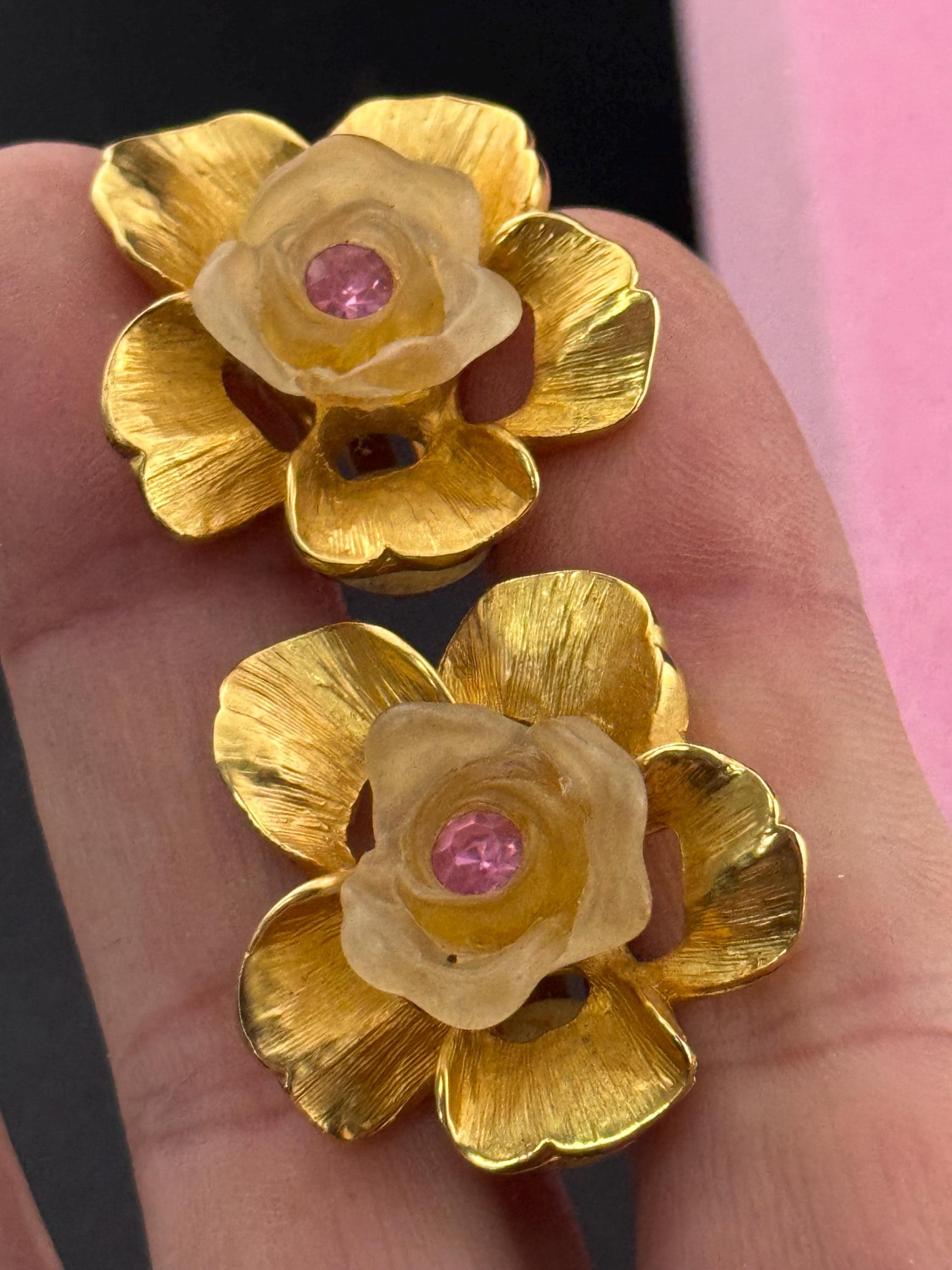 Vintage Ivana signed clip on earrings with gold large flowers Inset with opaque petals and pink rhinestone