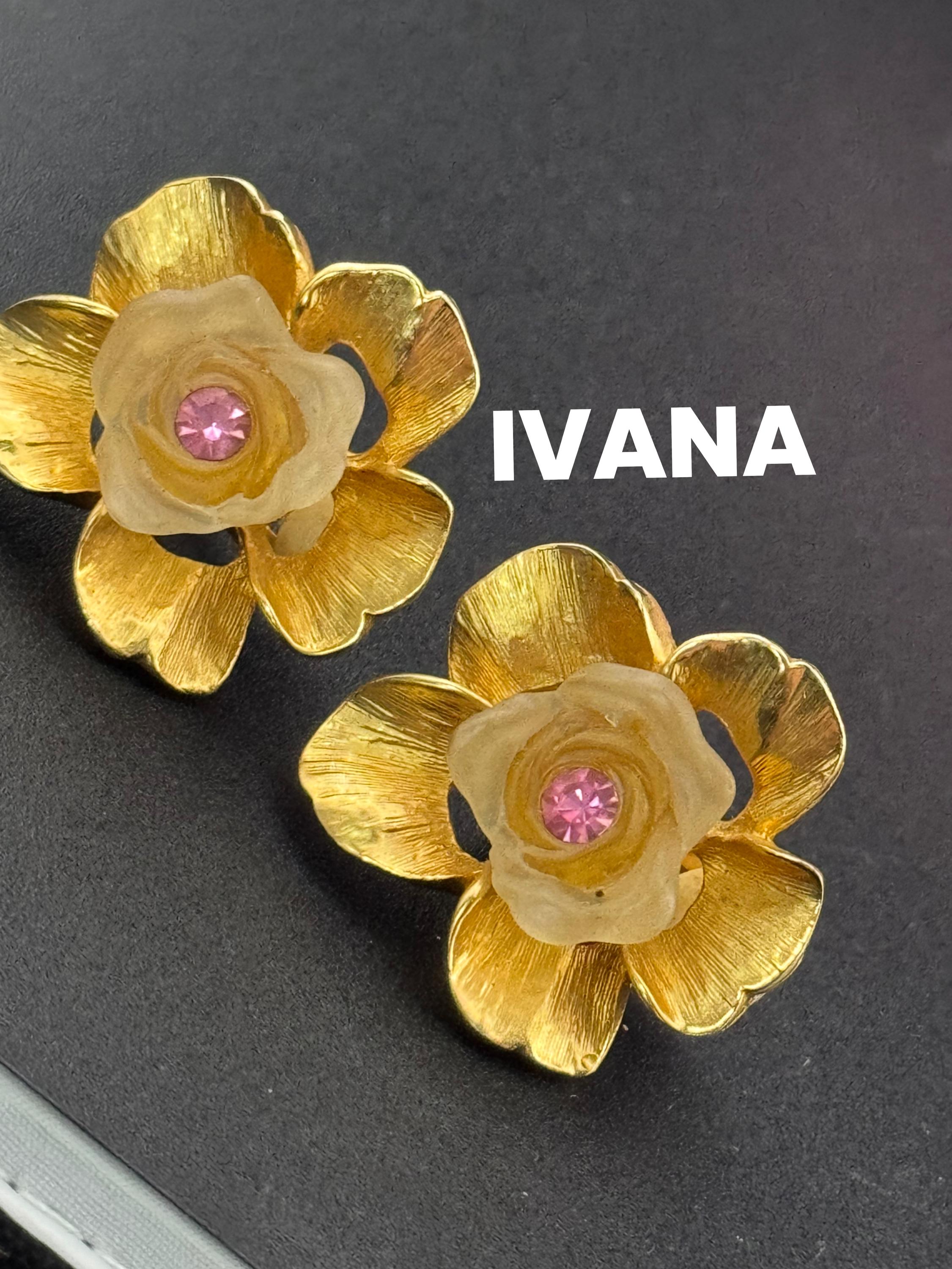 Vintage Ivana signed clip on earrings with gold large flowers Inset with opaque petals and pink rhinestone