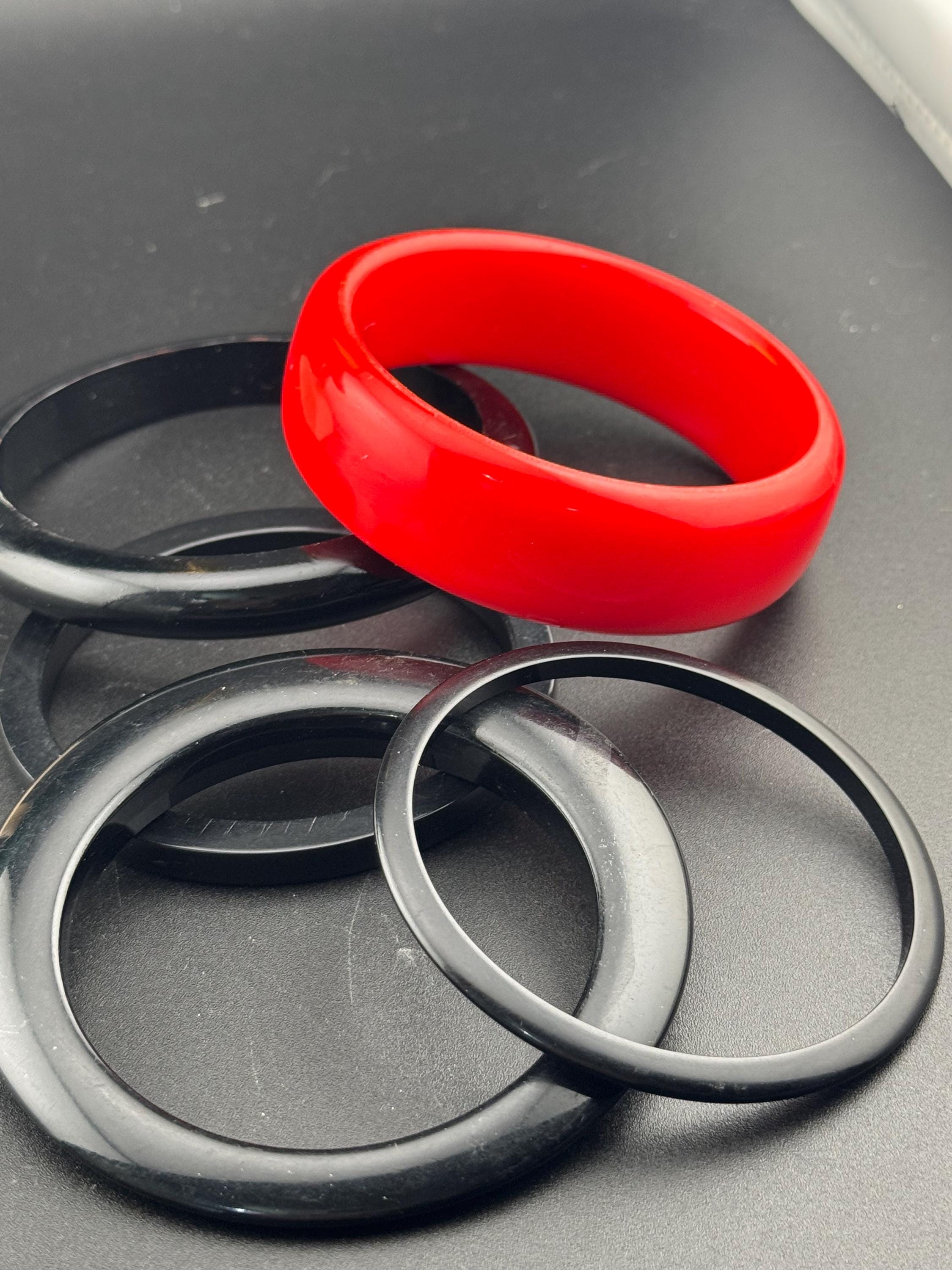 Vintage stack of black and red Chunky stylish plastic bangles retro acrylic bracelets