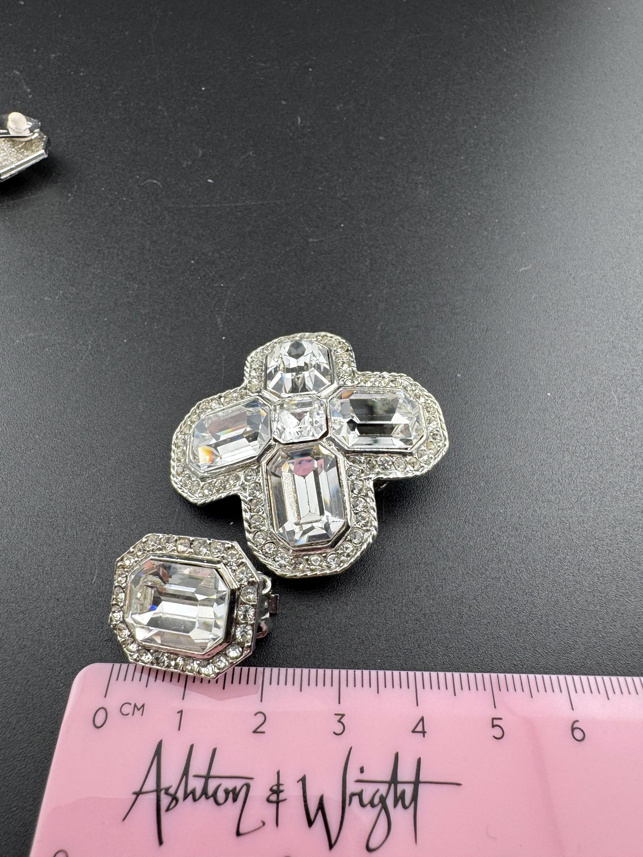 Vintage 1980s Swarovski silver tone crystal set clear diamanté octagonal clip on earrings with matching cross brooch