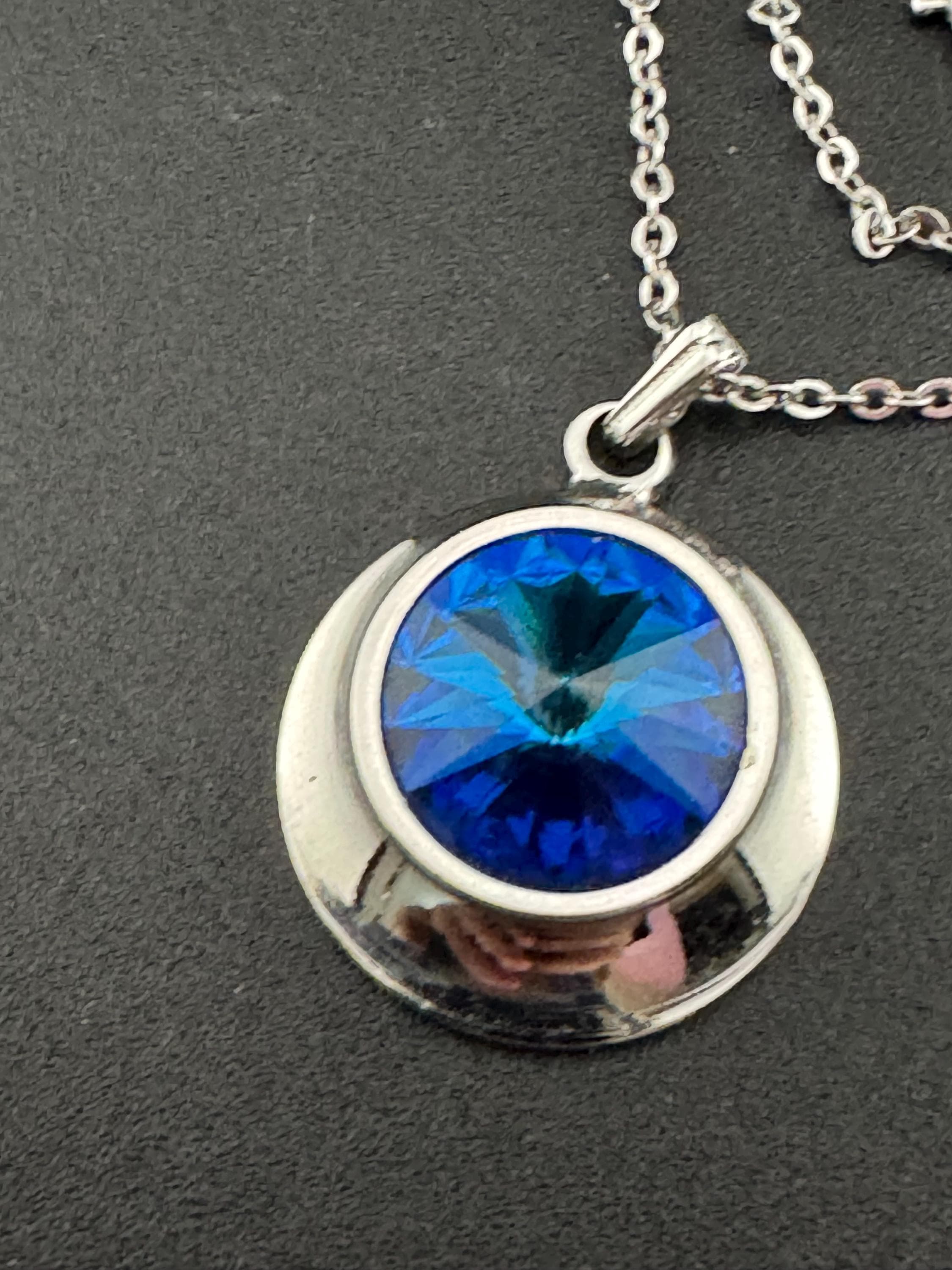 signed Sarah Coventry blue liquid light design silver tone blue Rivoli crystal 1970s pendant drop necklace, vintage designer