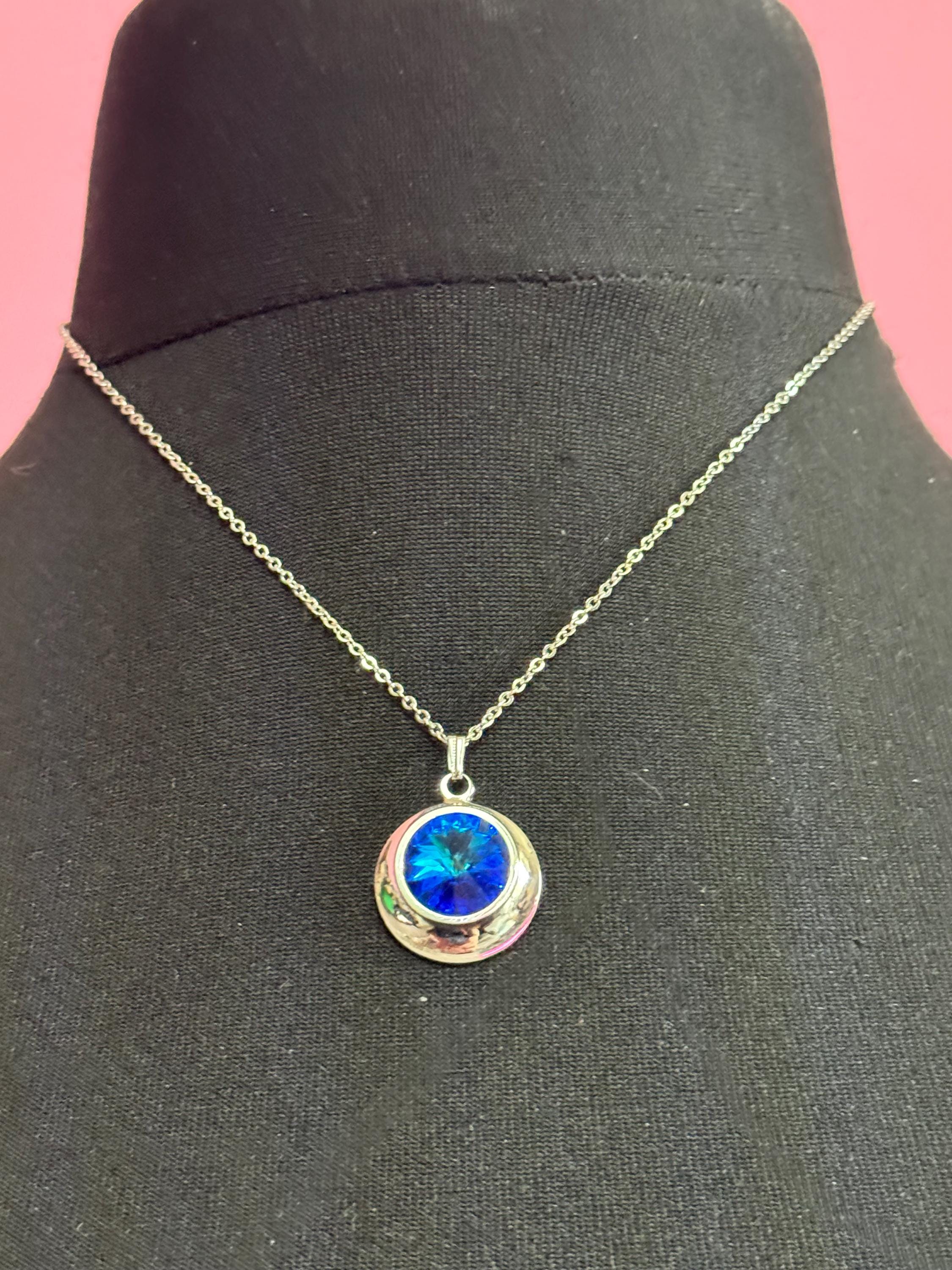 signed Sarah Coventry blue liquid light design silver tone blue Rivoli crystal 1970s pendant drop necklace, vintage designer