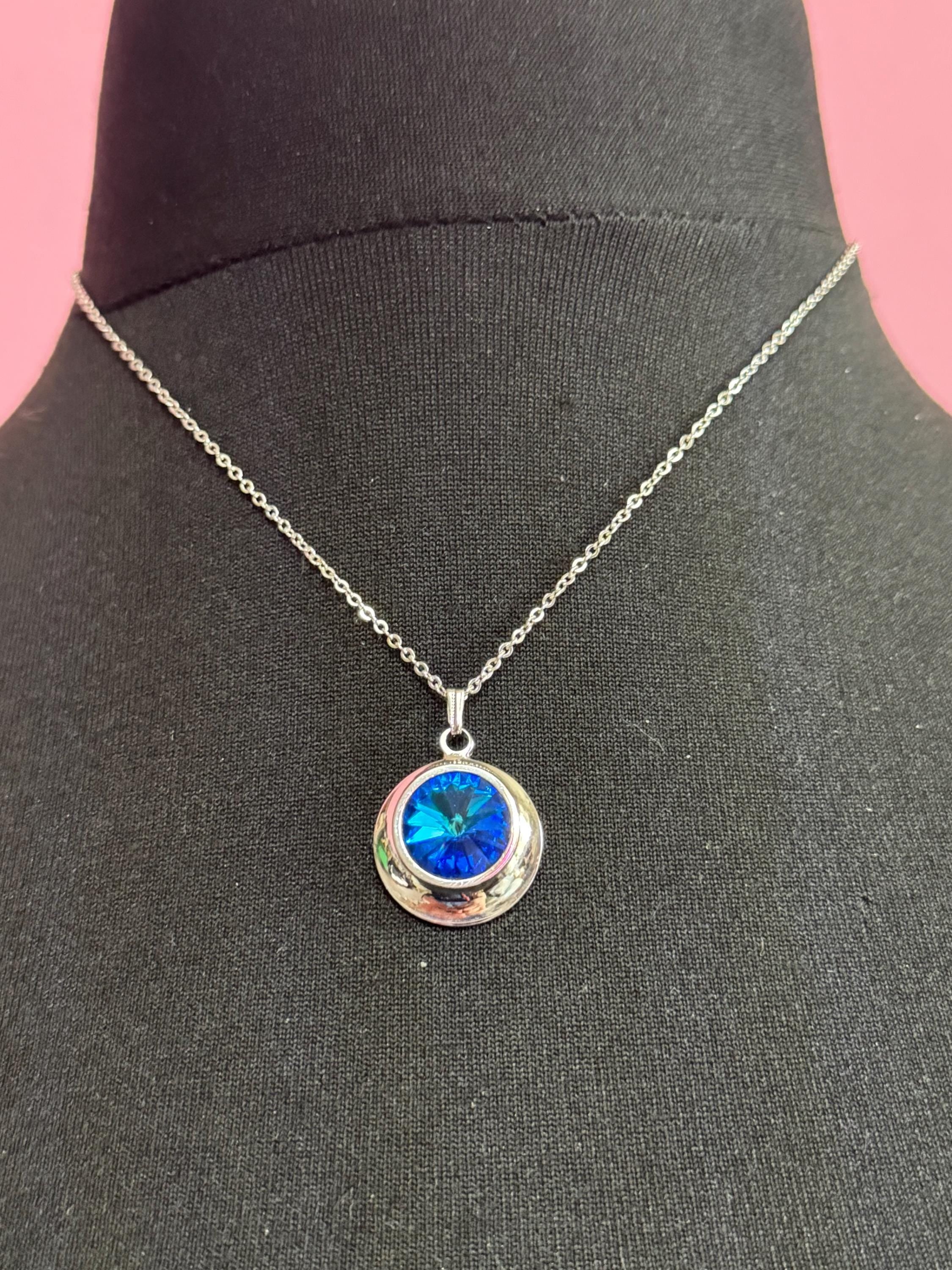 signed Sarah Coventry blue liquid light design silver tone blue Rivoli crystal 1970s pendant drop necklace, vintage designer